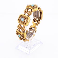 Verziertes Gliederarmband aus Goldette im viktorianischen Revival der 1960er Jahre mit türkisfarbenen Cabochons