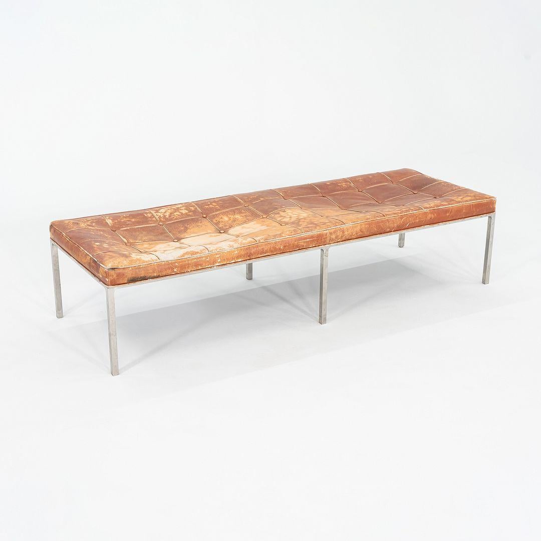 This is a rare stainless steel and leather bench designed in the 1960s by Gordon Bunshaft and Davis Allen of Skidmore, Owings & Merrill (SOM). The design features a stainless steel frame supporting an upholstered brown leather cushion.
 
 While we