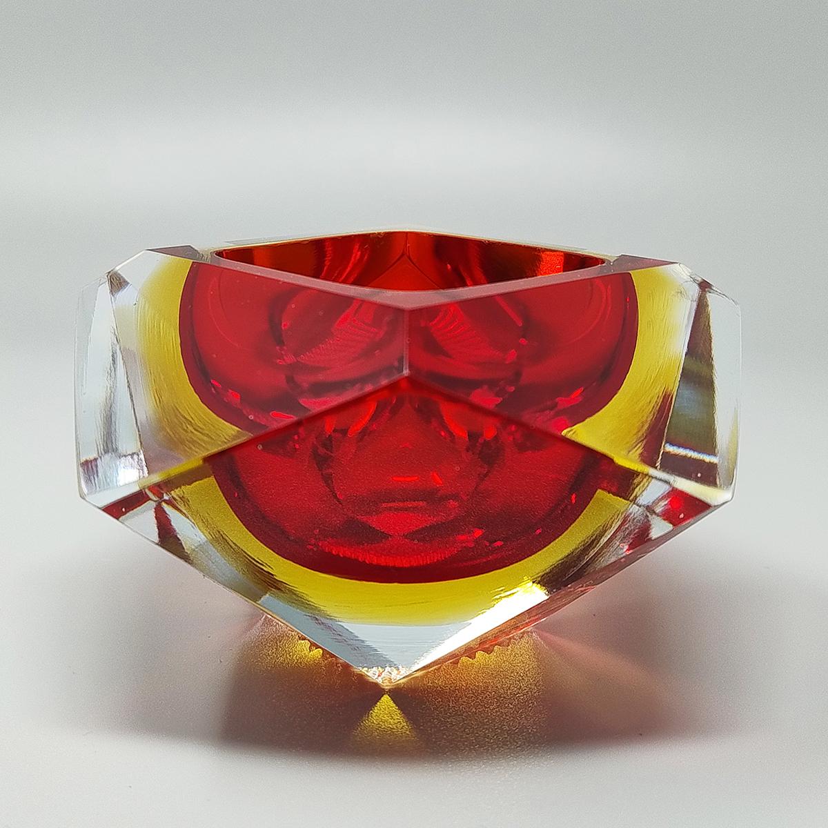 1960s Gorgeous red and yellow ashtray or catchall by Flavio Poli for Seguso in Murano sommerso glass. Made in Italy. So rare to find it in this color.
The item is in excellent condition.
Dimensions:
5,11 diameter x 2,75 H inches
cm 13 diameter x cm