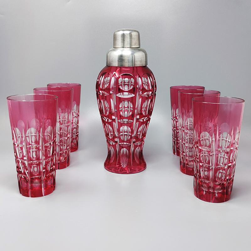 1960s Gorgeous red bohemian cut crystal glass cocktail shaker with six glasses in excellent condition. Made in Italy
Dimension :
Cocktail shaker
diameter 3,54 x 8,66 height inches
diameter cm 9 x cm 22
Glasses
diameter 2,75 x6,29 height