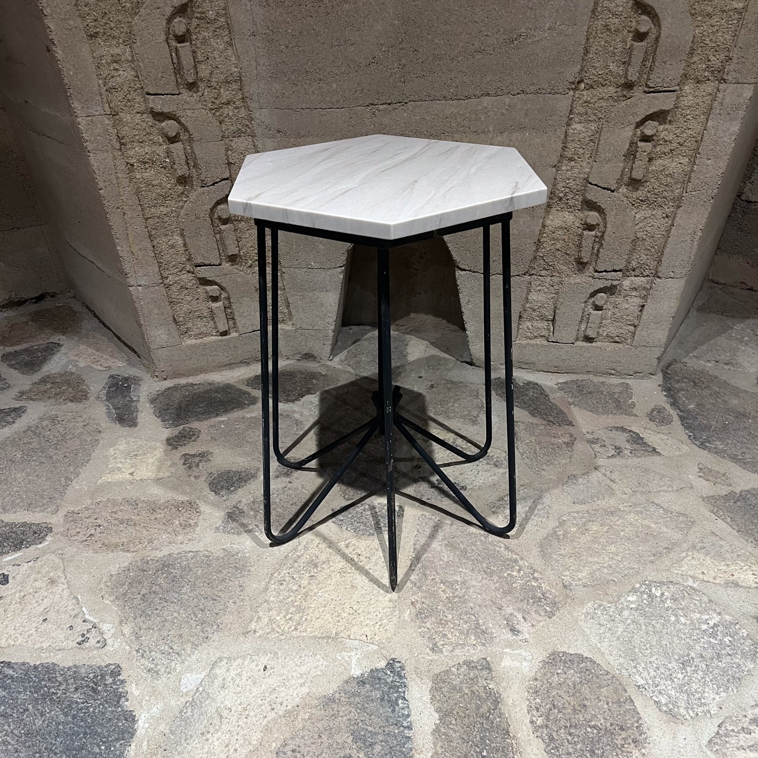 
Sculptural Hexagonal Side Accent Table French style of Jean Royere
Stone on Black Iron
24.75 h x 19.5 diameter
Refer to images provided.
Preowned original unrestored vintage. Wear consistent with age and use.
LA OC Palm Springs delivery