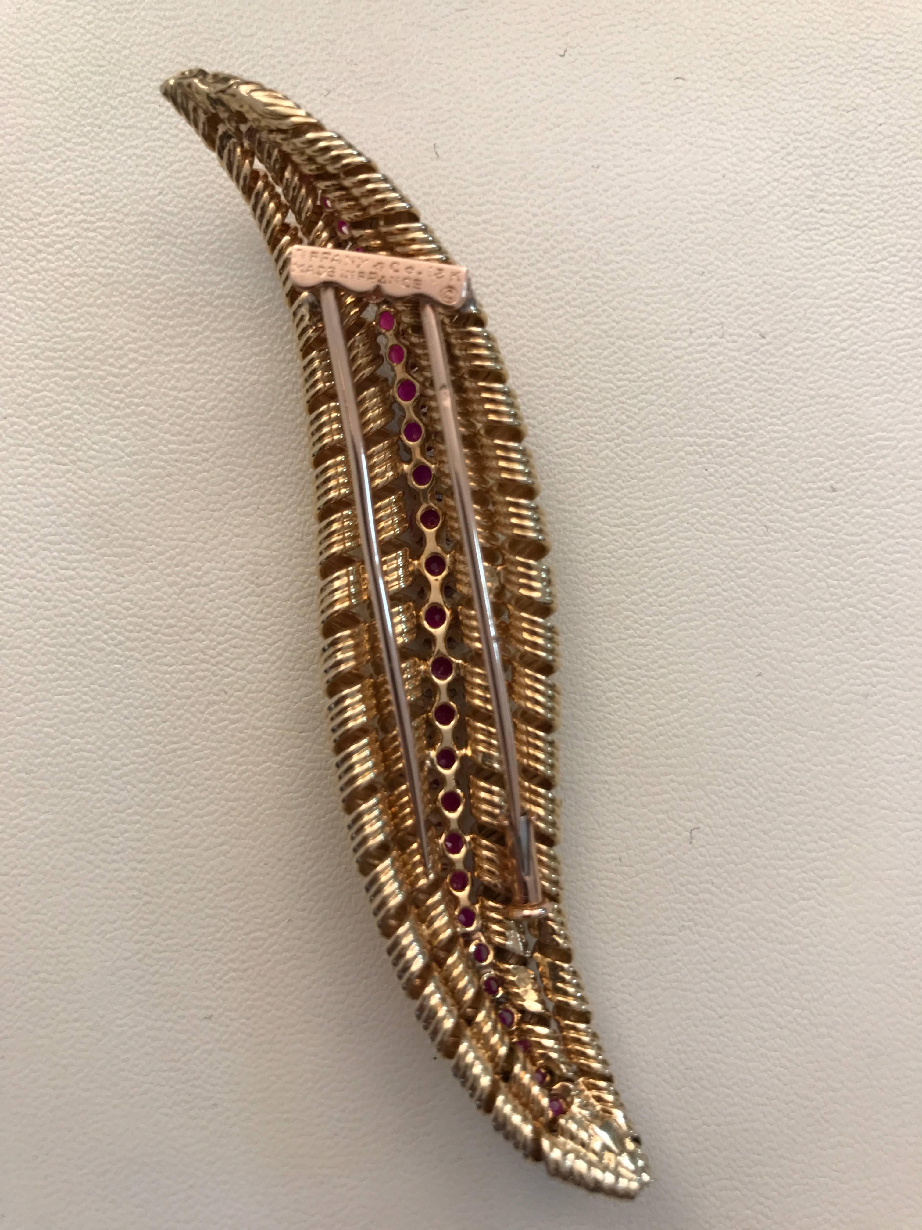 Women's 1960s Graduated Ruby and 18 Karat Yellow Gold Brooch by Tiffany & Co. For Sale