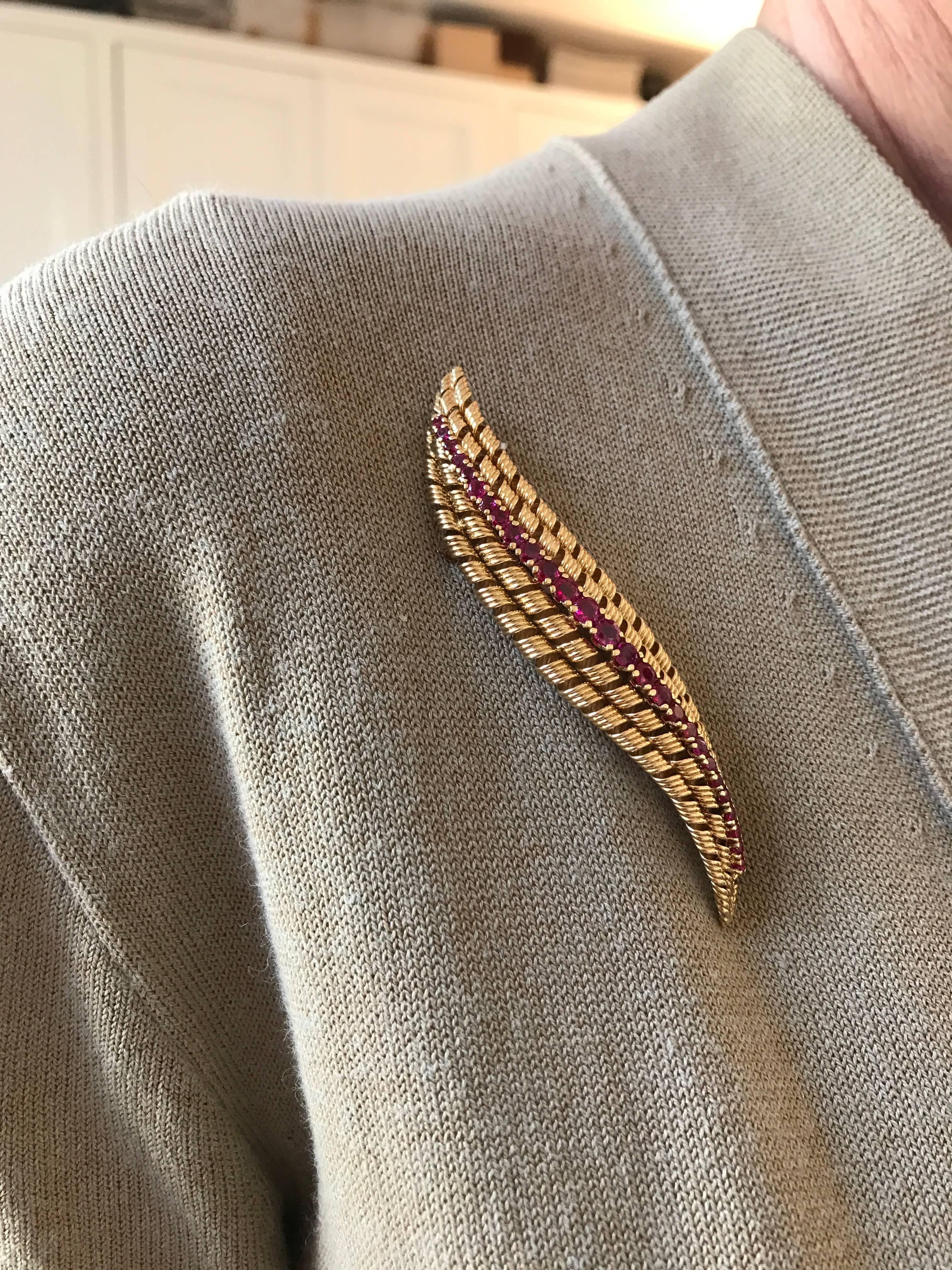 A stunning and superb quality 18ct yellow gold double row reeded twist brooch with single row 27 graduated rubies, Tiffany & Co., America, circa 1960