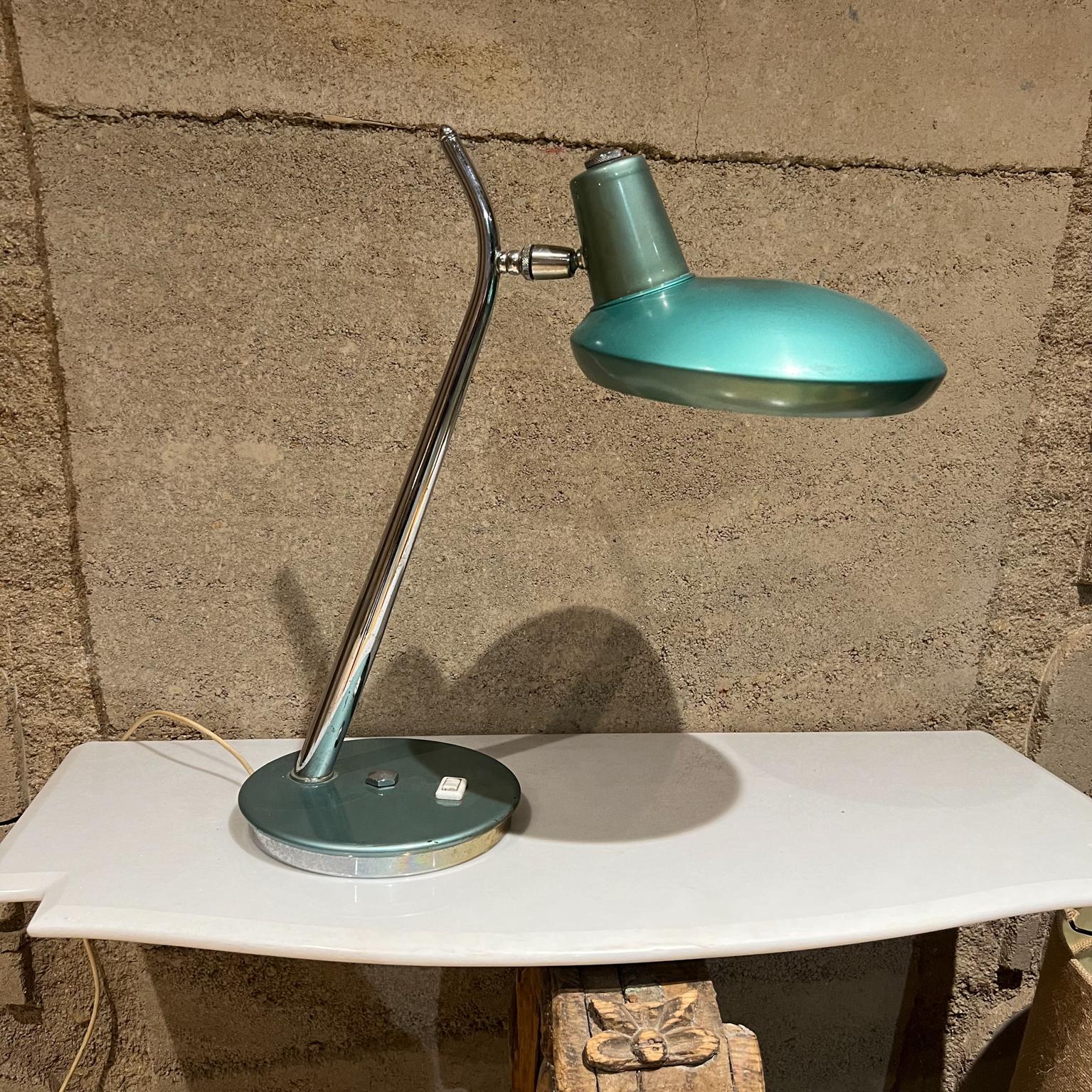 1960s Green Desk Lamp Space Age Boomerang Style of Luis Pérez de la Oliva for Fase, Madrid, Spain
Unmarked
18 tall x 8.75 w x 18
Preowned original unrestored vintage condition.
Button at base for on and off.
Refer to images provided

