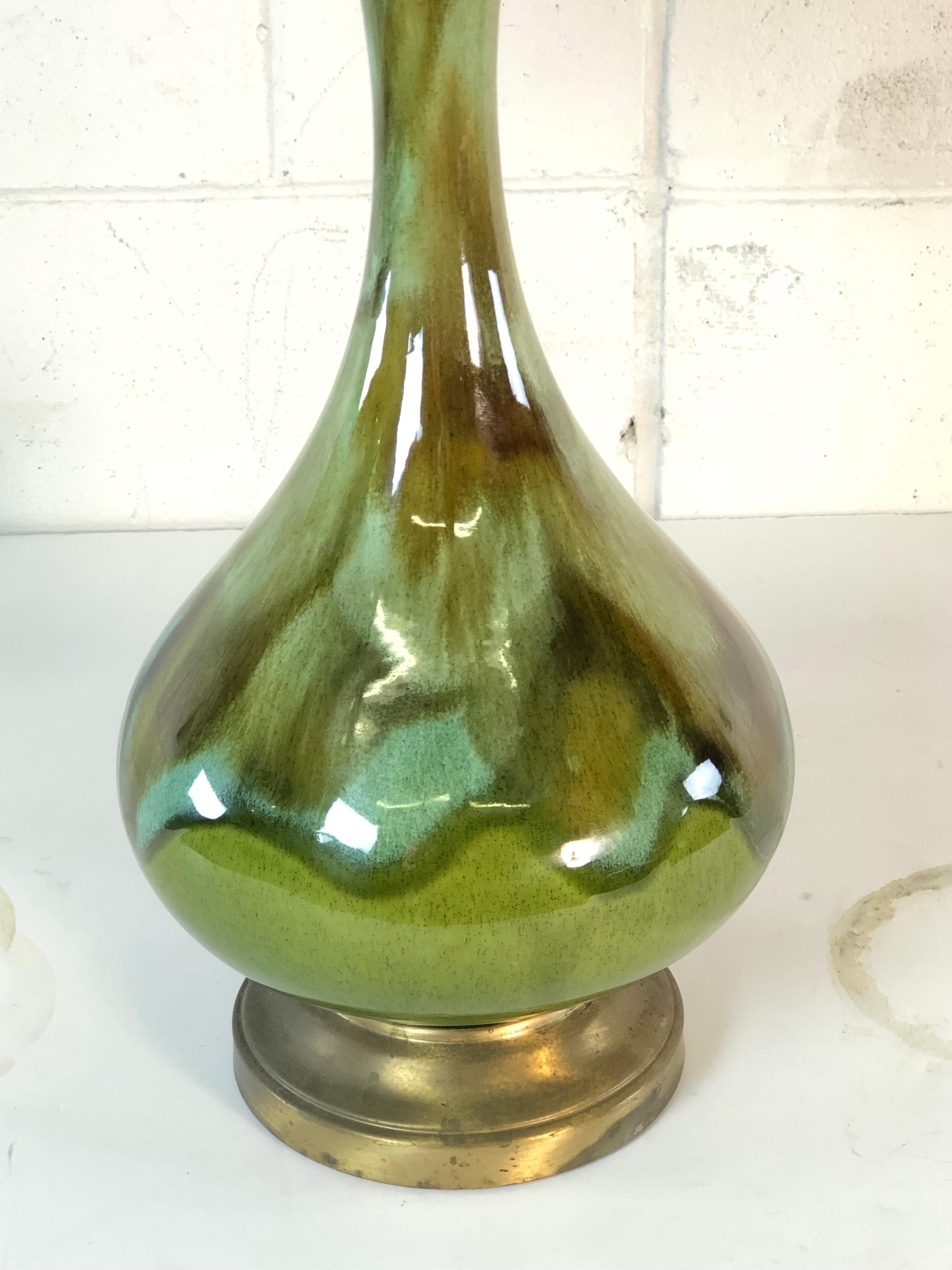 Vintage 1960s green drip glaze table lamp. The lamp is wired for the US and in working condition. Has a very midcentury drip glaze design. Socket, 21”H. Shade is not included. No marks.