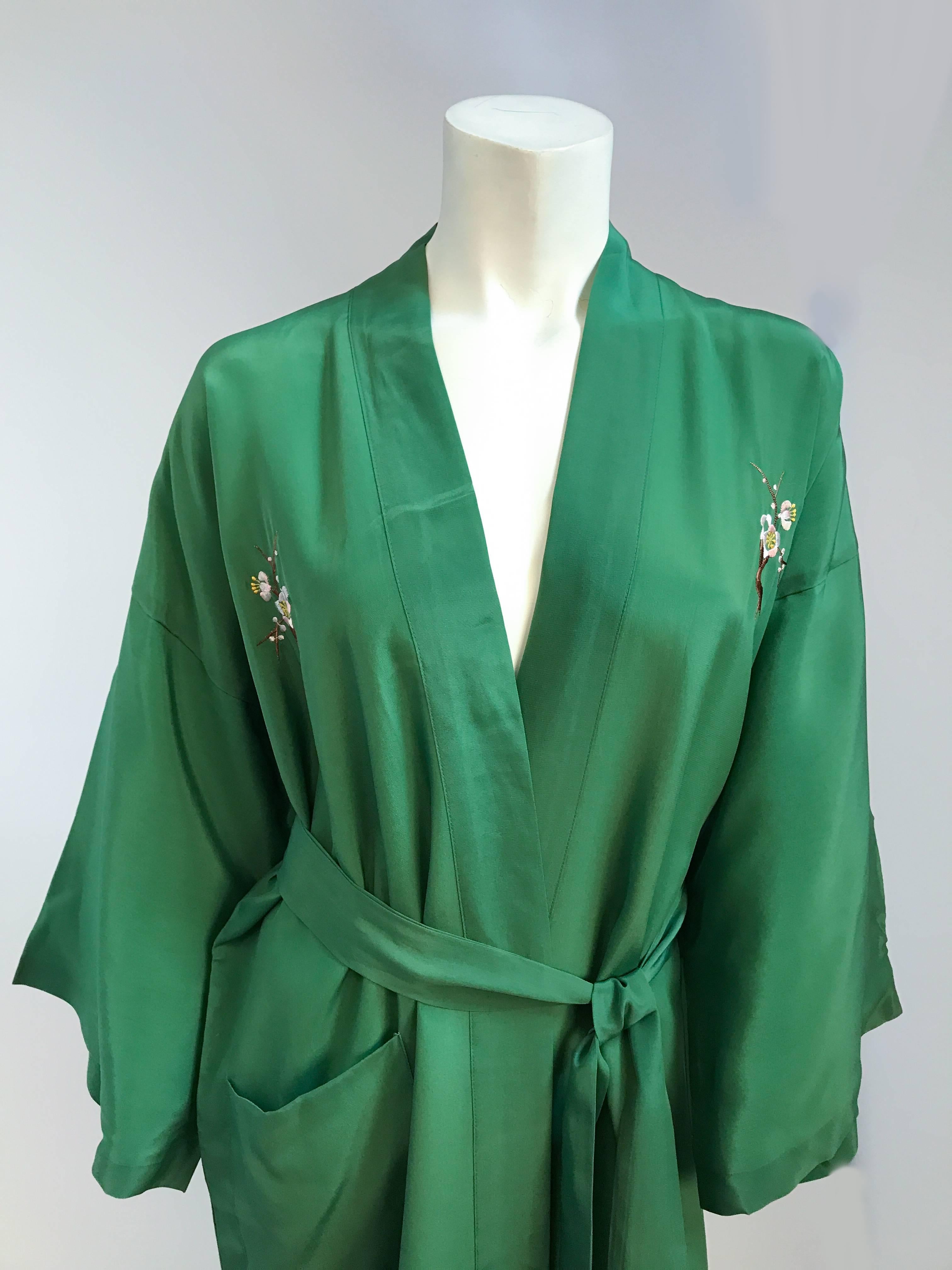 1960's Green Embroidered Kimono. Green Kimono with cherry blossom embroidery. Matching waist sash and one pocket in the front.  