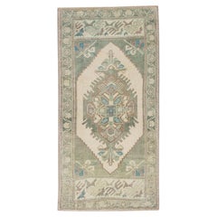 1960s Green Multicolor Vintage Turkish Mini Rug 1
10" X 3
2"