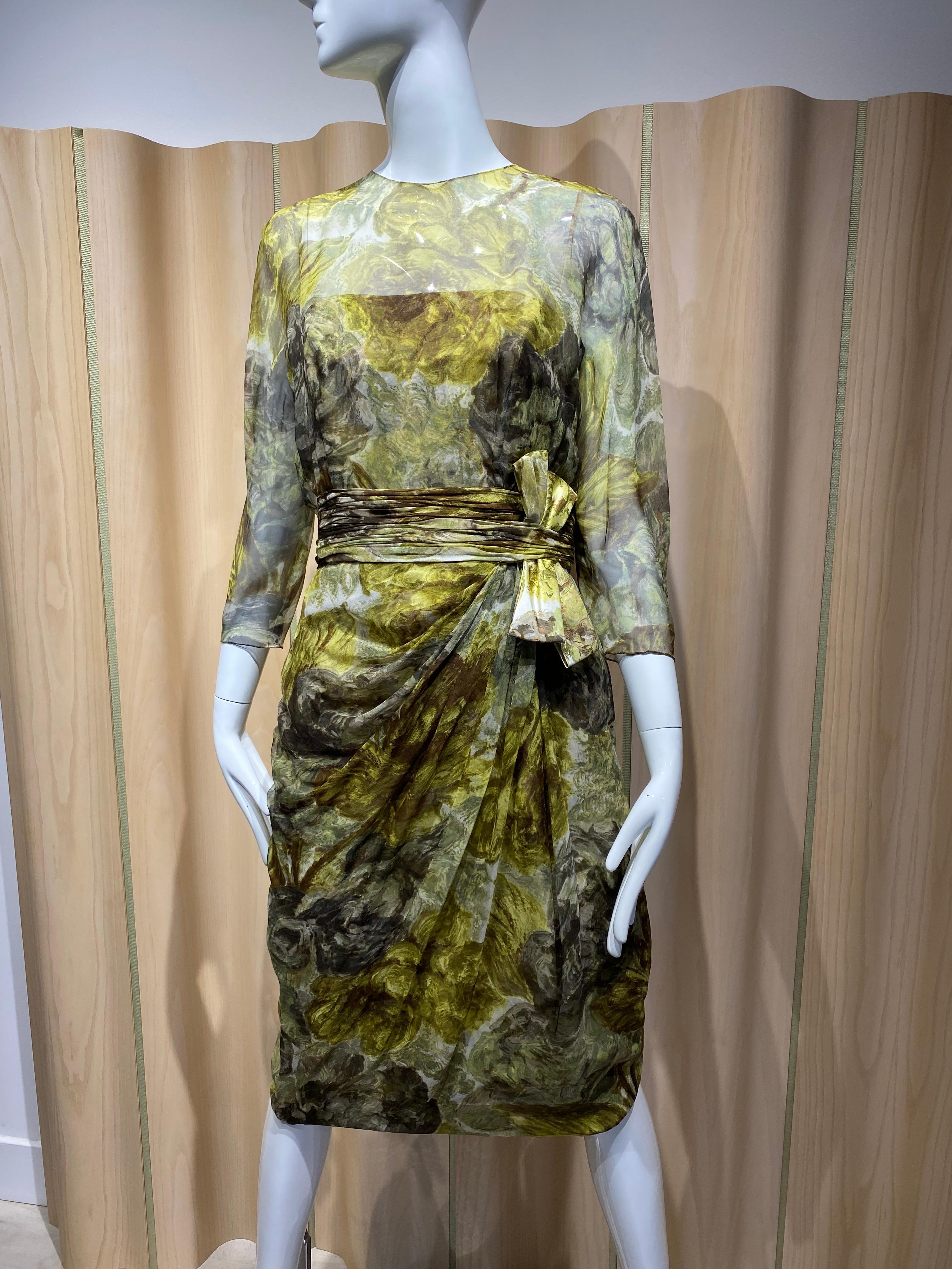 Vintage 1960s  pure silk green and chartreuse yellow abstract watercolor floral 
 ruched waist with bow detail, zips and buttons in back.
Size 6
Measurements:
Dress Length: 43