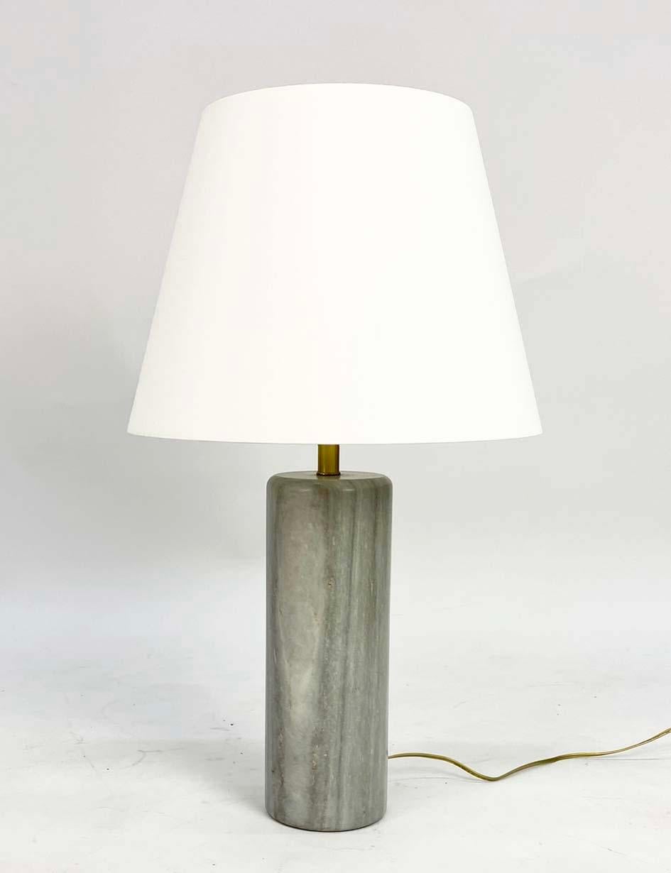 Here's a very handsome and heavy marble lamp by Nessen Studios that retains its original label. The base is a grey marble with amber veining--the finish is very satiny and is lovely to the touch.

The measurements listed are with the shade, which is