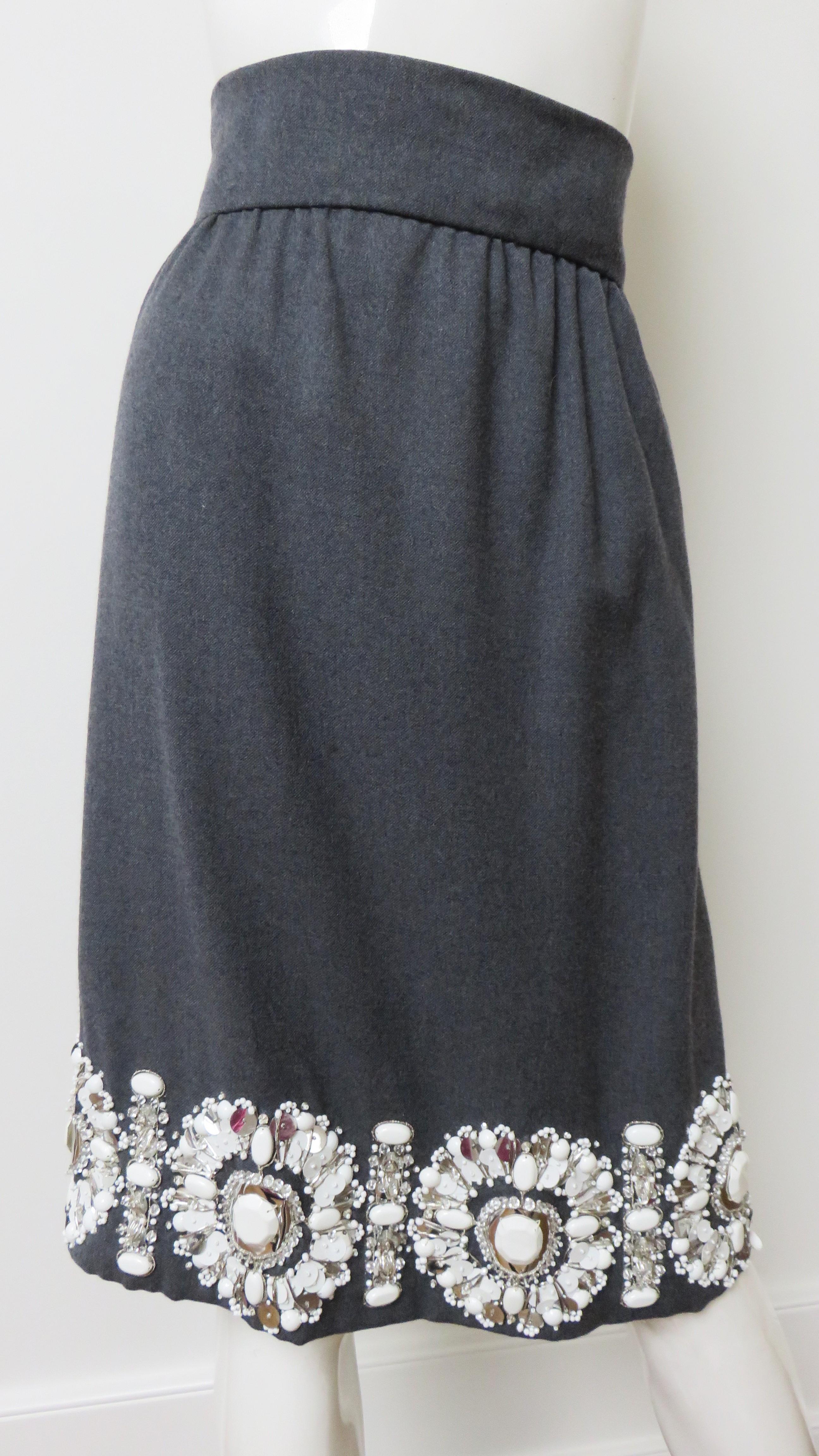 A fabulous grey wool skirt with elaborate beading around the hem.  It has a 2 3/4 