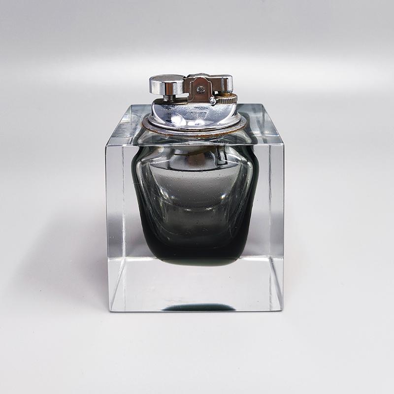 1960s Stunning grey table lighter in Murano sommerso glass By Flavio Poli for Seguso. Made in italy
The item is in excellent condition and it works perfectly
Dimension:
2,75