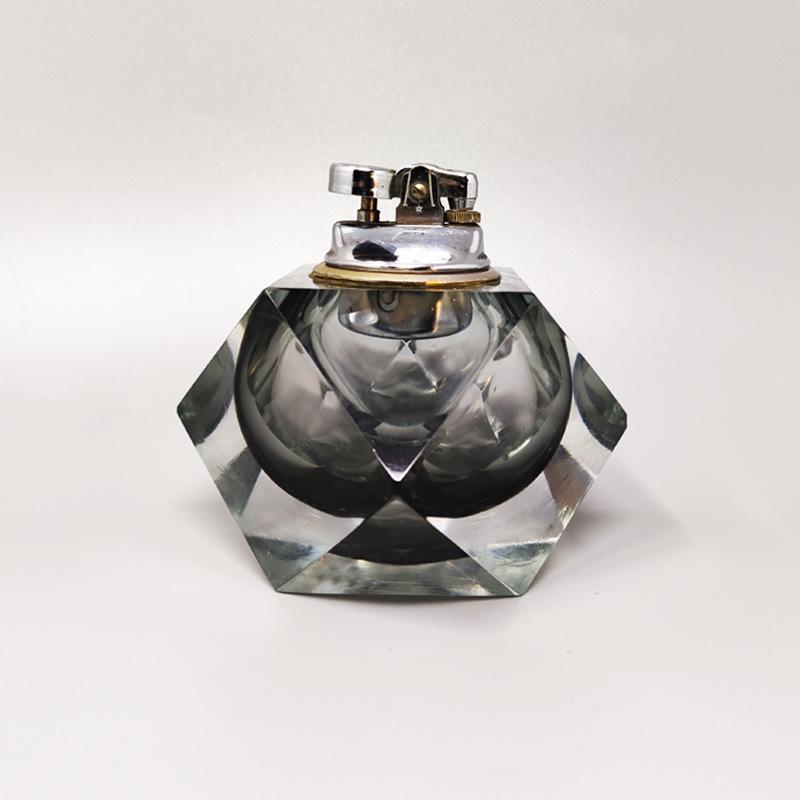 1960s Gorgeous grey table lighter in Murano Sommerso glass by Flavio Poli for Seguso. Made in italy
The item is in excellent condition and it works perfectly
Dimensions:
4,33