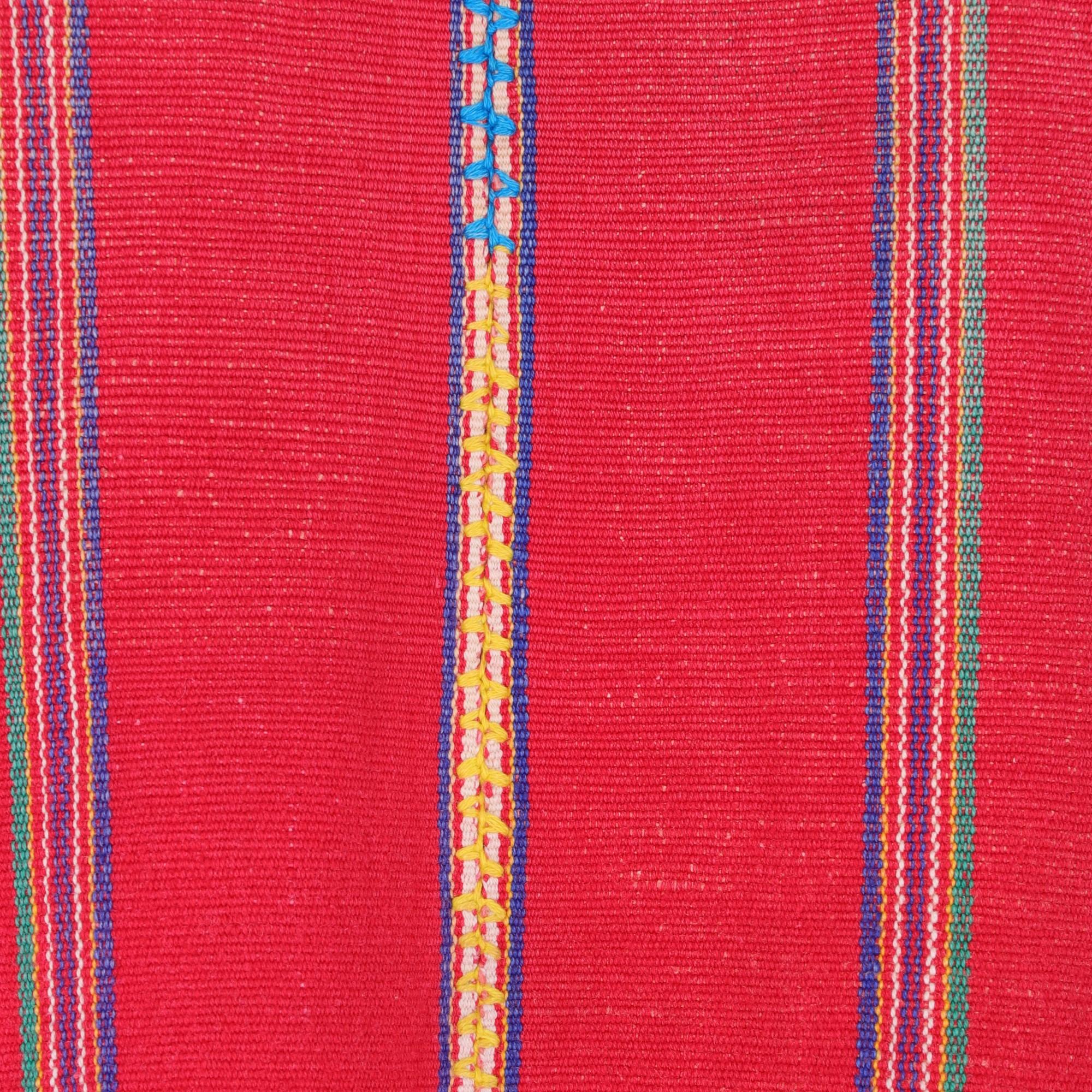 Guatemala ethnic handmade straight top in red cotton with blue white yellow and green vertical stripes. With squared neckline and decorative flower embroideries.
The item shows small signs of wear on the embroideries, as shown in the pictures.
Being