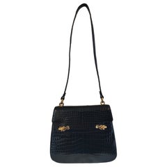1960s Gucci Black crocodile leather gold and silver hardware shoulder bag