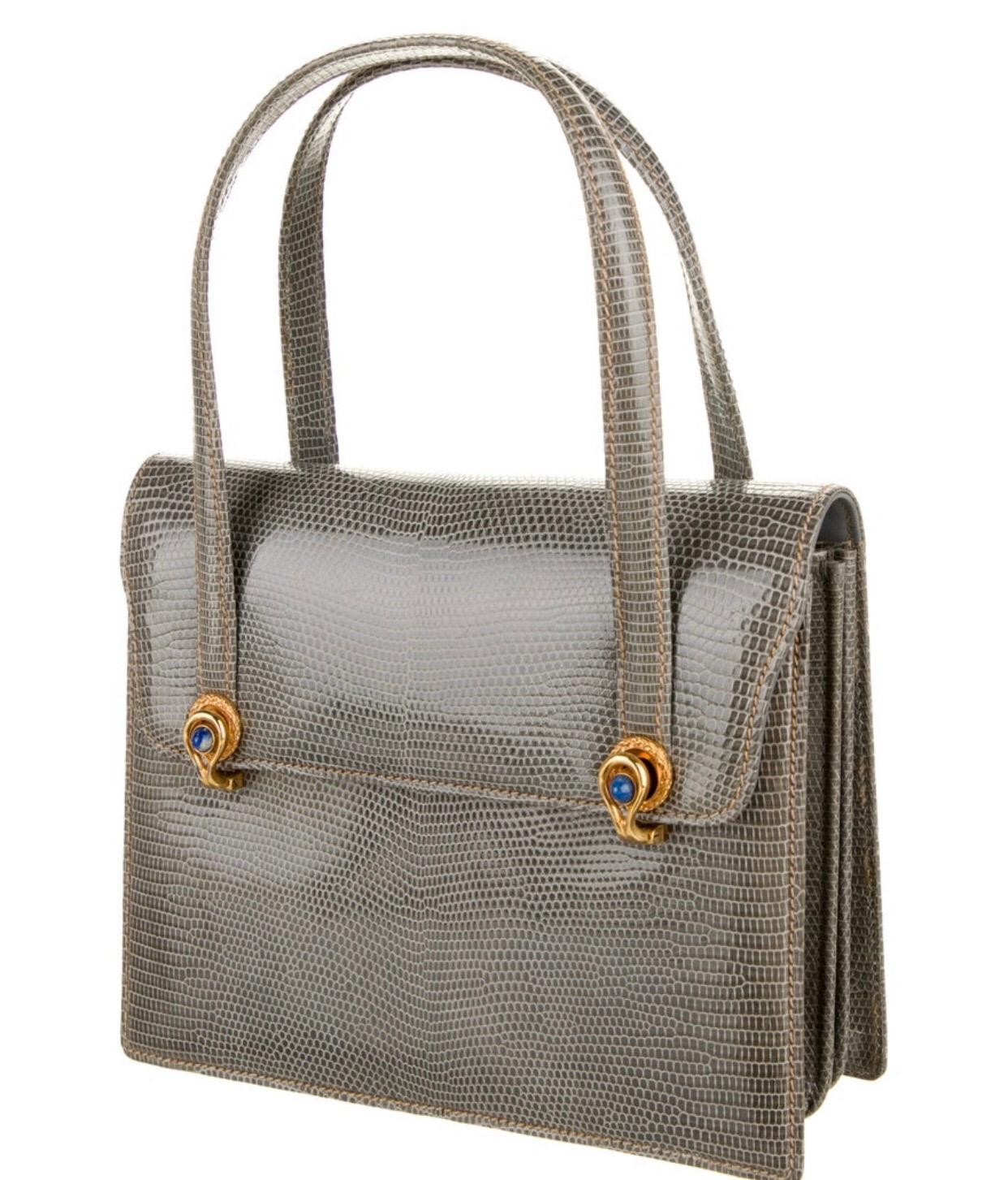 1960s GUCCI grey lizard handbag. Condition: excellent, looks unused. With original dust bag and box. Lapis stones on clasps. 
7