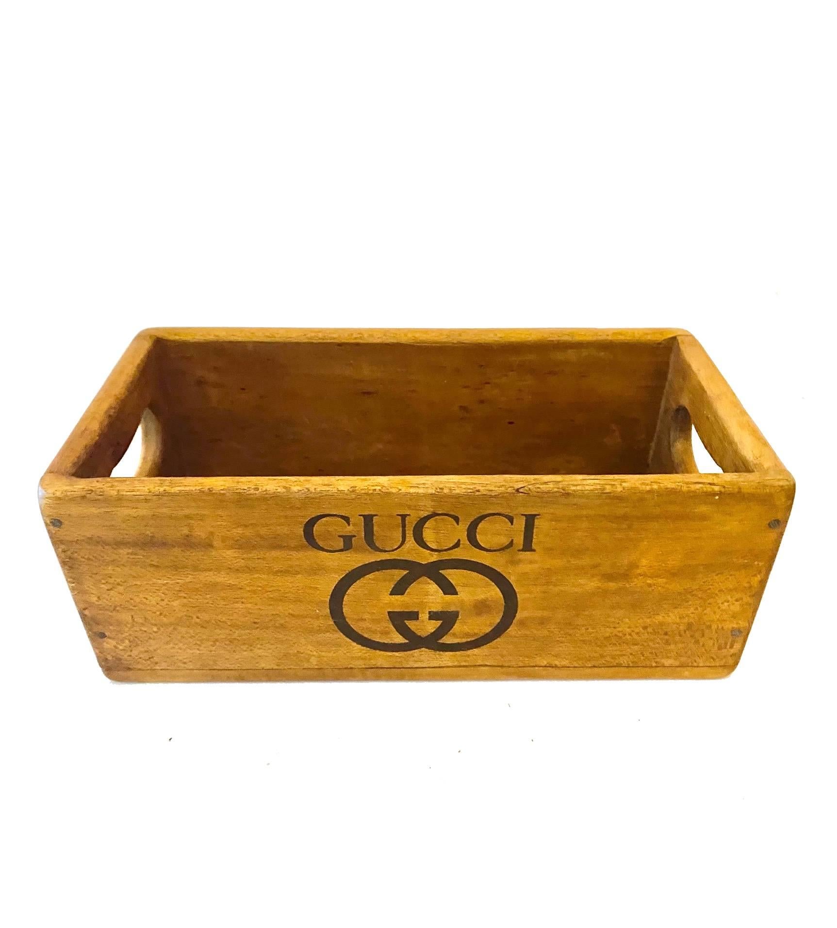 This Gucci Wooden Storage Box, a relics from the `60s, offers an ageless style to safeguard all your treasured items with timeless sophistication. Meticulously created with an exquisite eye for detail, its traditional look and distinguished
