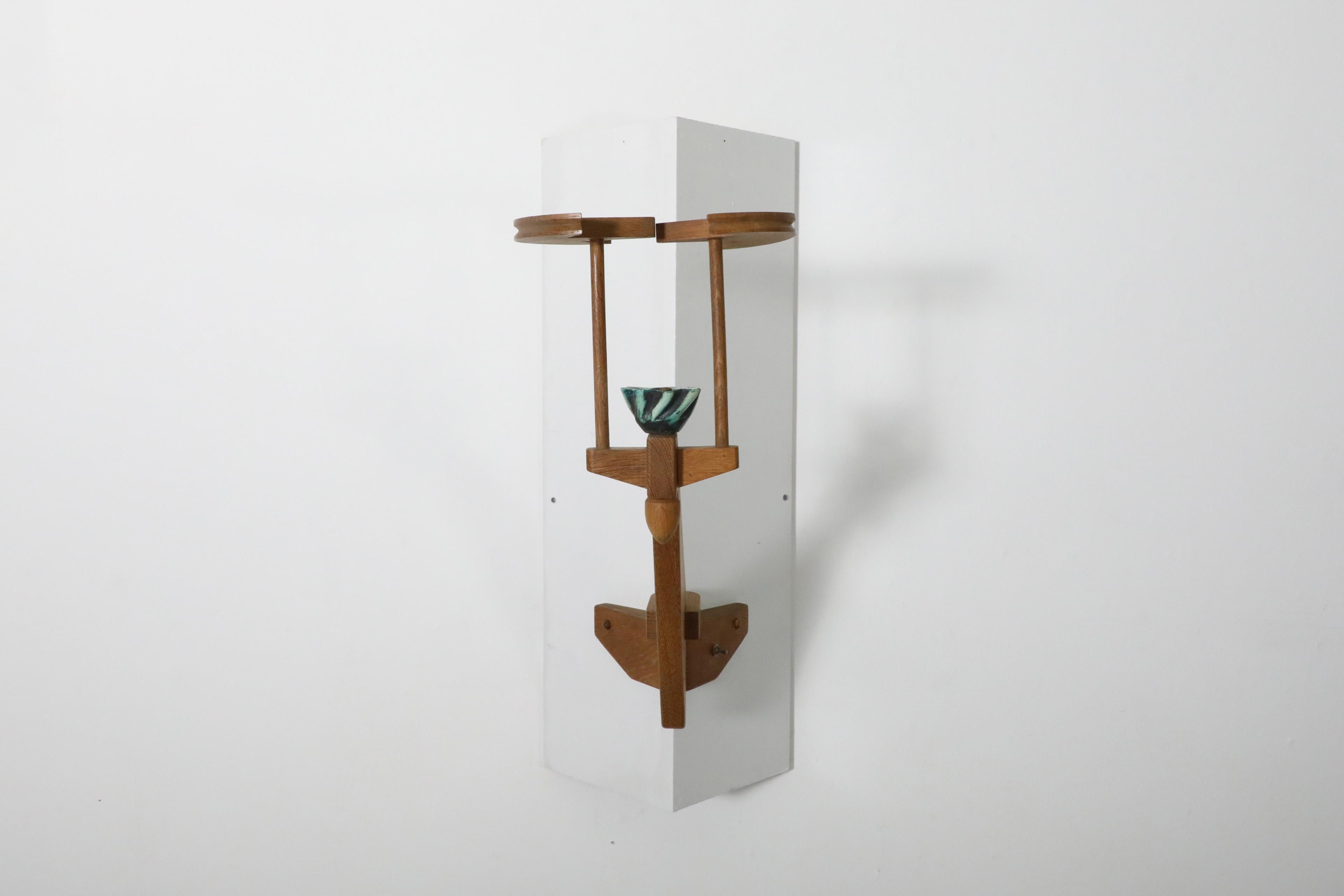 1960's, French, Mid-Century Oak and ceramic corner wall sconce by famed designer duo Guillerme et Chambron for manufacturer 