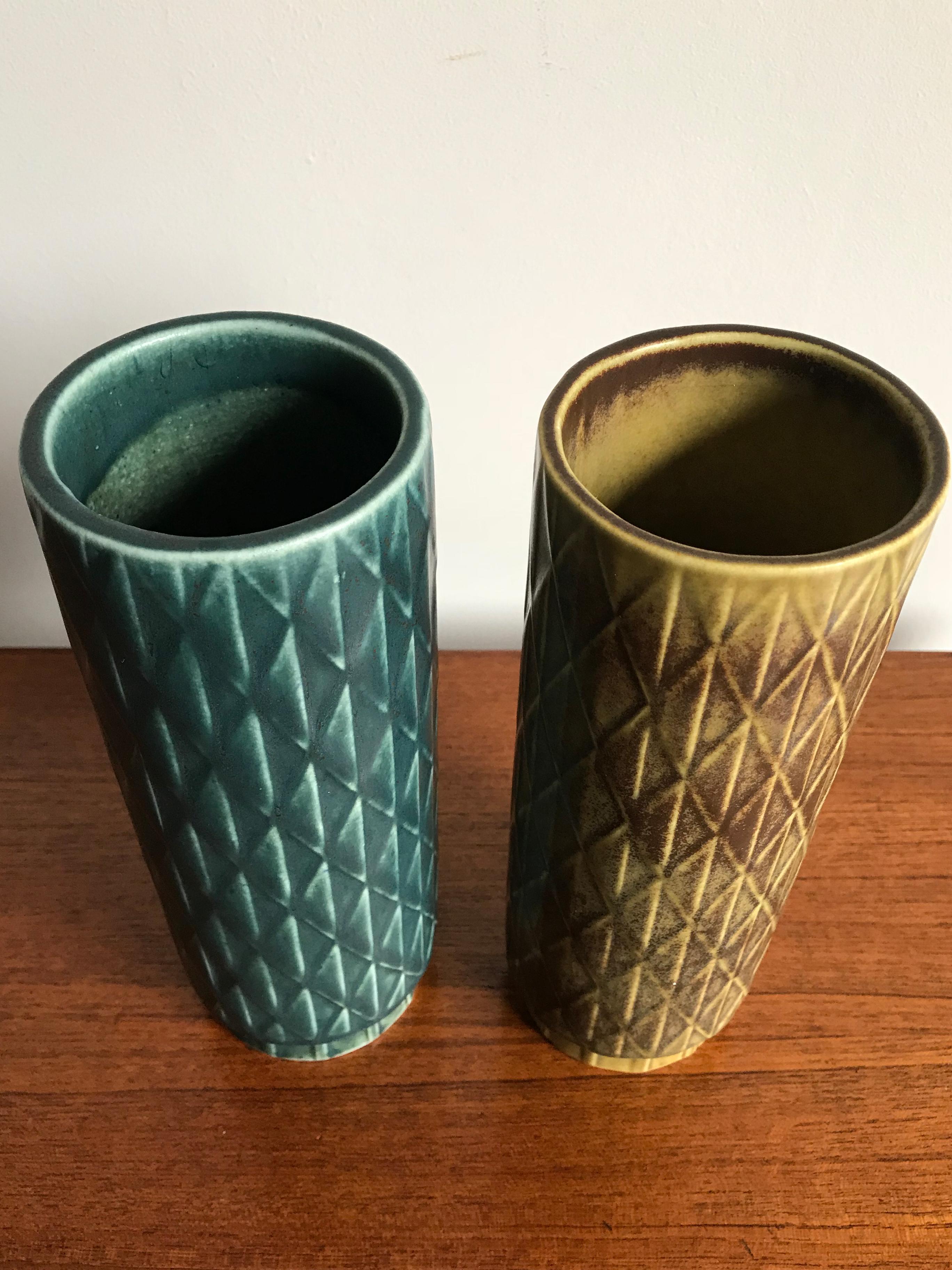 1960s Scandinavian stoneware vases set designed by Gunnar Nylund for Rörstrand, made in Sweden, marked on the bottom, in matte enamel.
Dimensions: height 22 cm, diameter 8 cm.
