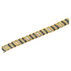 1960er Hammerman Brothers Nachlass-Armband aus 18 Karat Gelbgold mit Diamanten und Saphiren 
