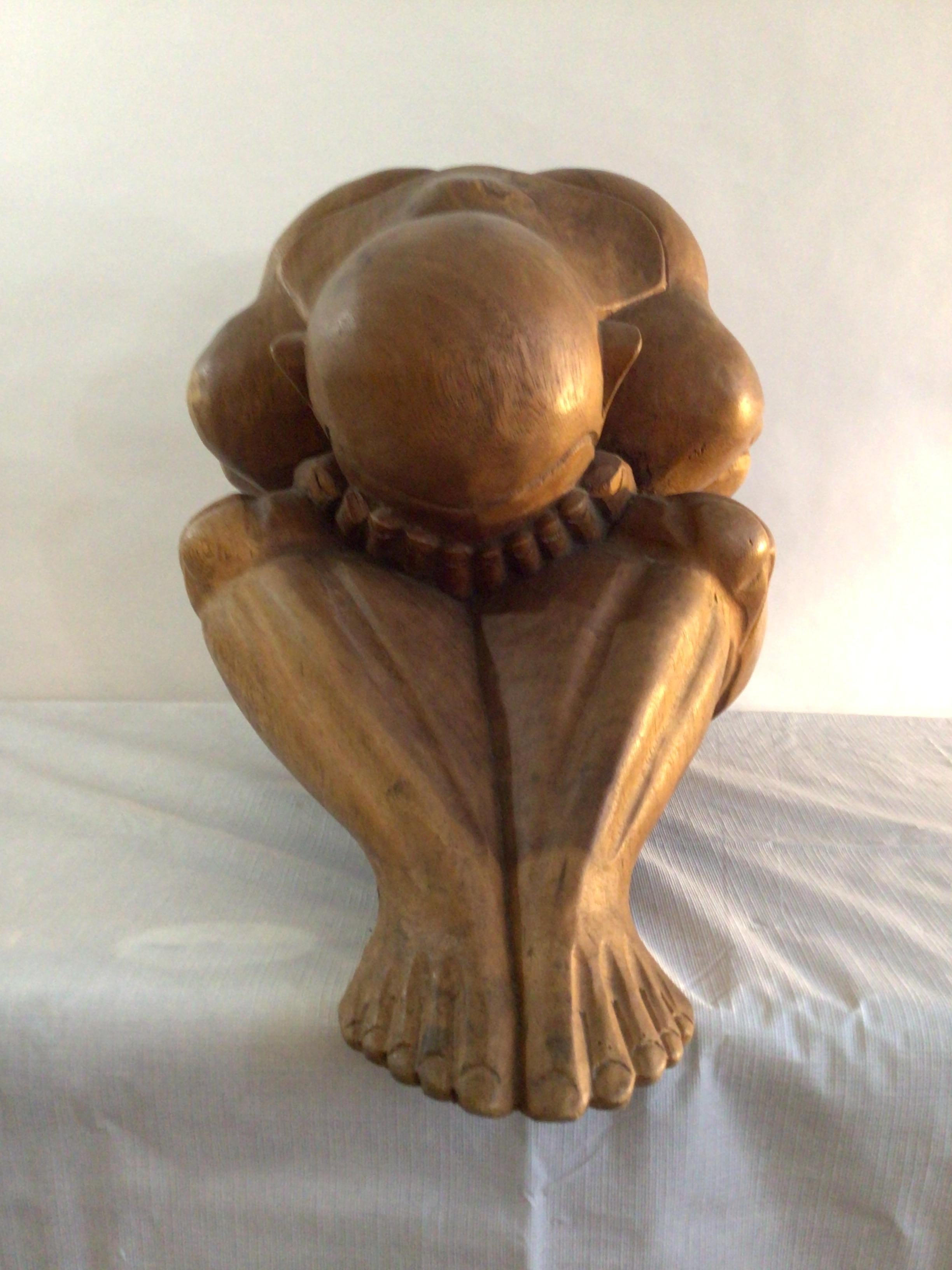 1960s Large Hand-Carved Wood Sculpture of Man Praying / Weeping Buddha
Abstract Yoga
Wrestler
There is a story about two warriors associated with the weeping Buddha. The warriors would face each other during battle wearing masks. Their masks