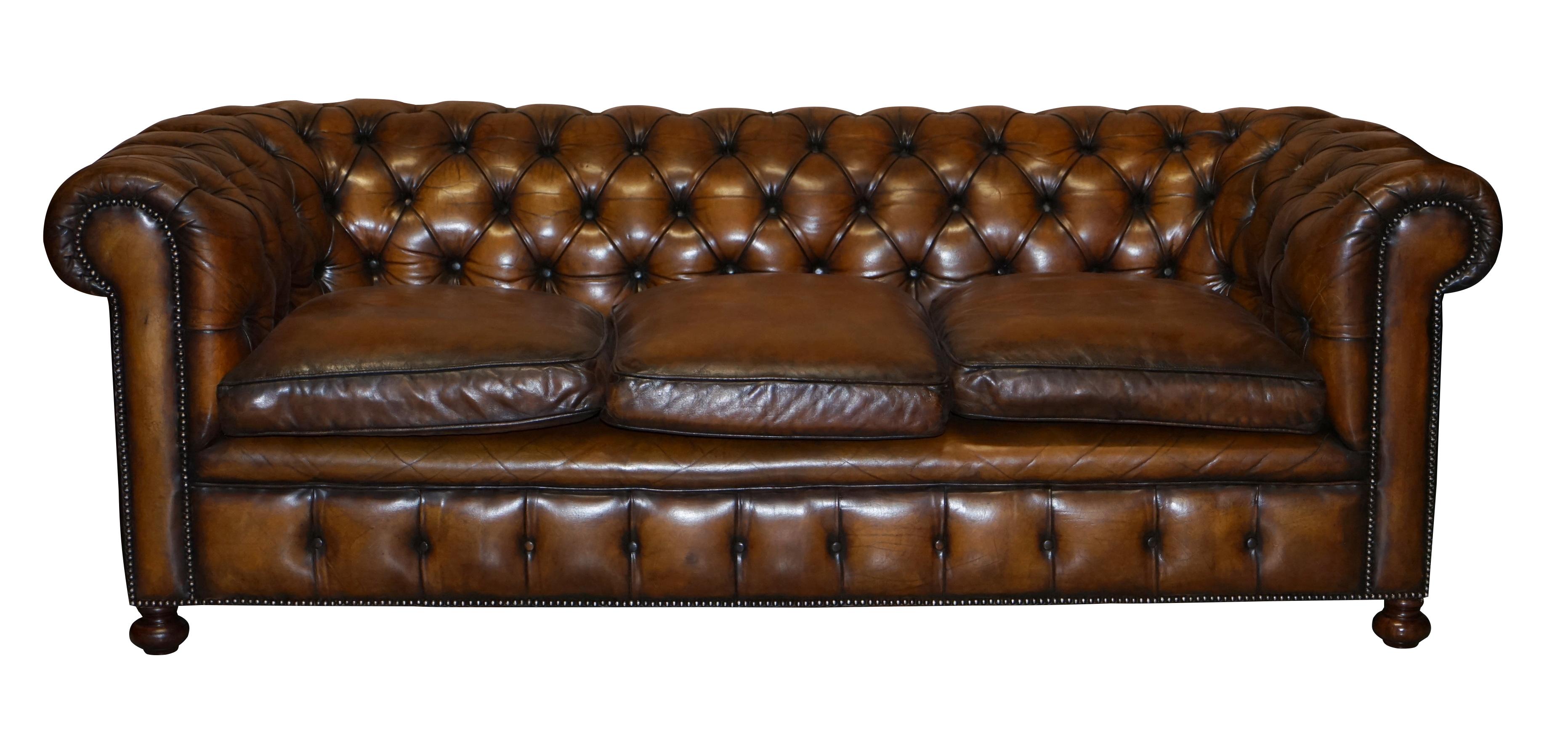We are delighted to offer for sale this exceptionally rare original 1960’s Cigar brown leather Chesterfield club sofa in restored condition with feather filled cushions 

This is a very rare find, you almost never come across mid 20th century