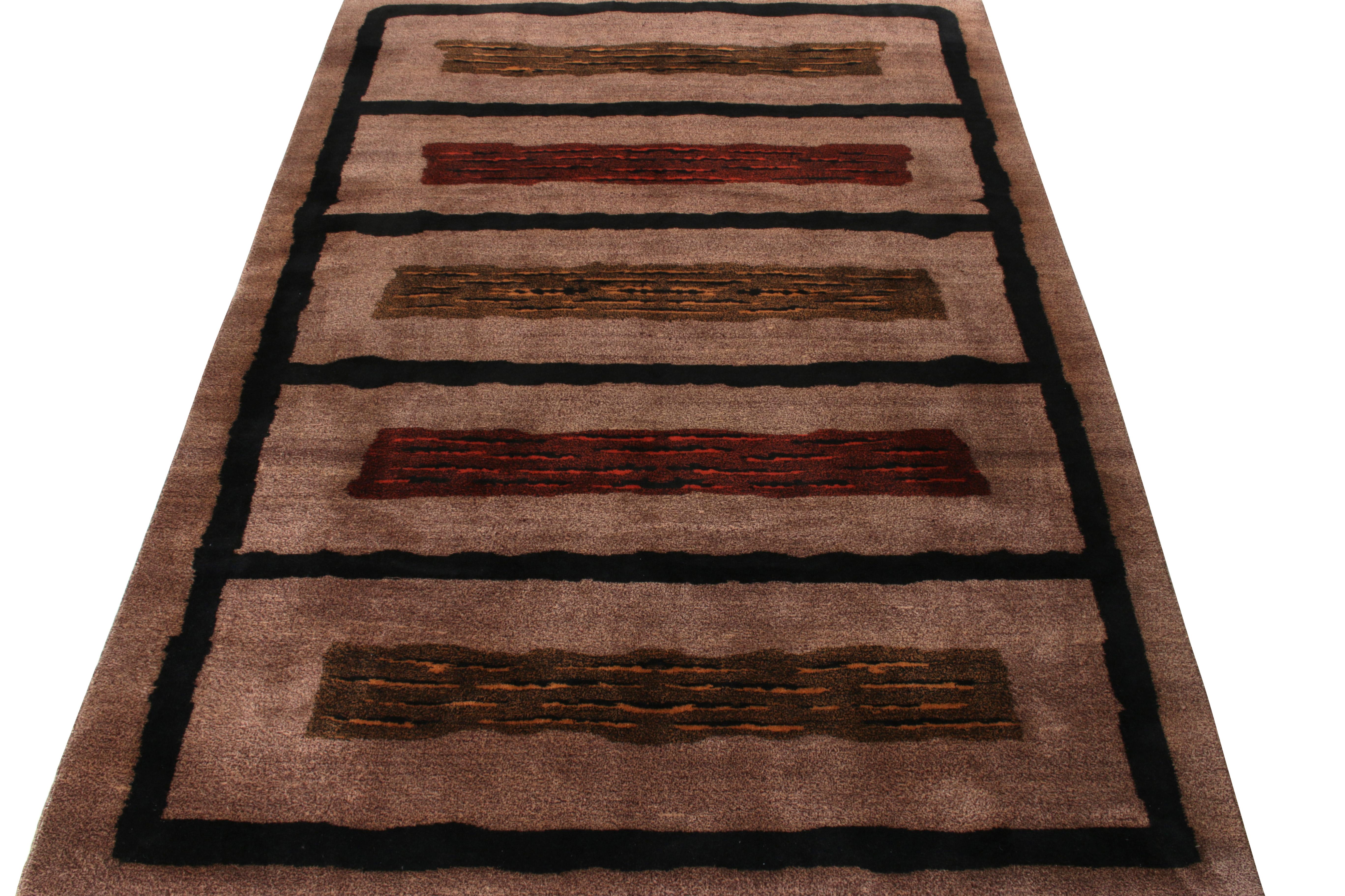 Originating from Turkey circa 1960-1970, a 7x10 panelled vintage mid-century rug featuring a neat geometric pattern in coal black, maroon and mustard on a luxurious brown backdrop. From Rug & Kilim’s Mid-Century Pasha Collection, commemorating the