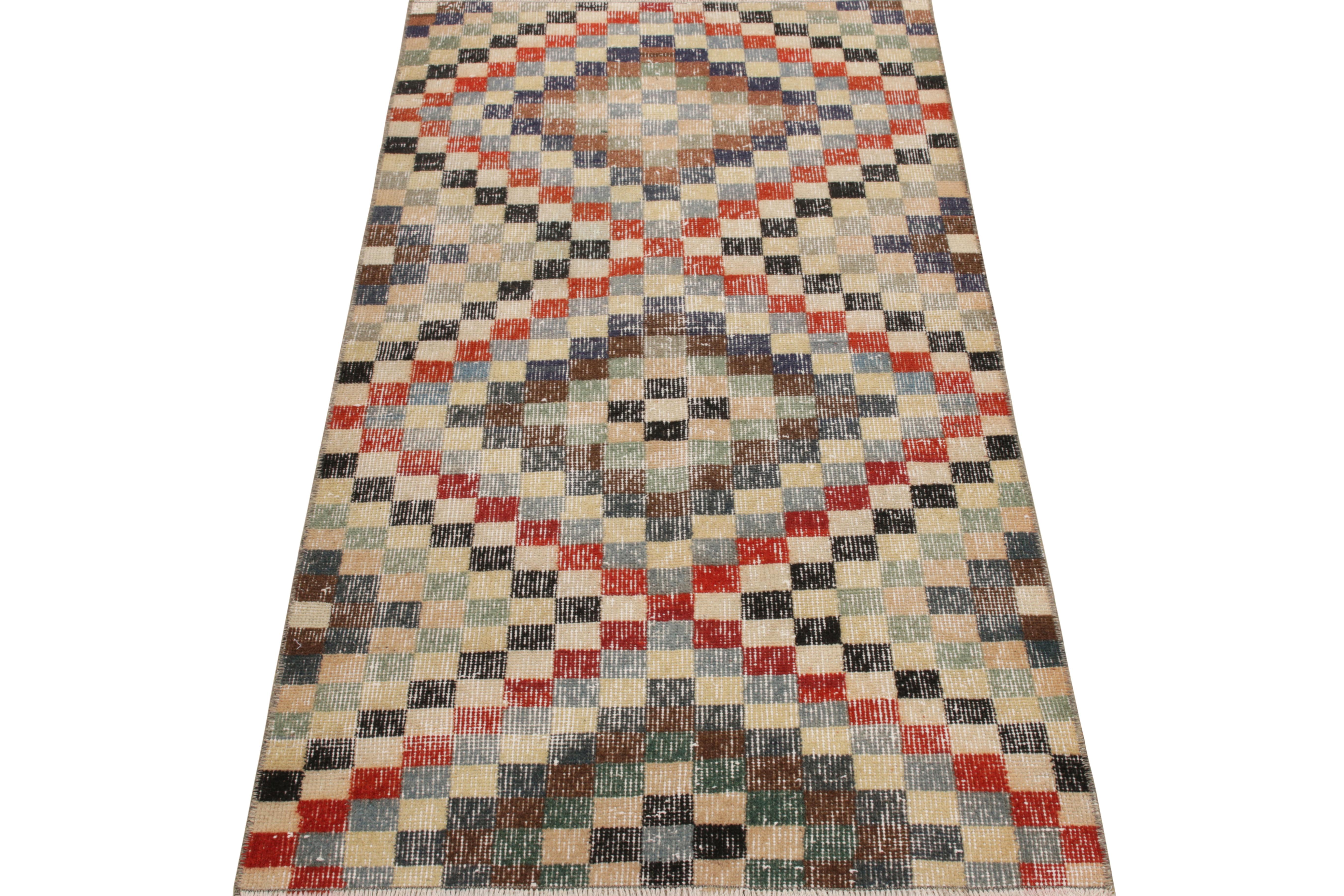 From a venerated Turkish designer, a 3 x 5 vintage rug of the 1960s—now joining our Mid Century Pasha collection. The shabby chic drawing enjoys a graceful multicolor geometric pattern for exceptional pagination in such warm-cool colorplay.