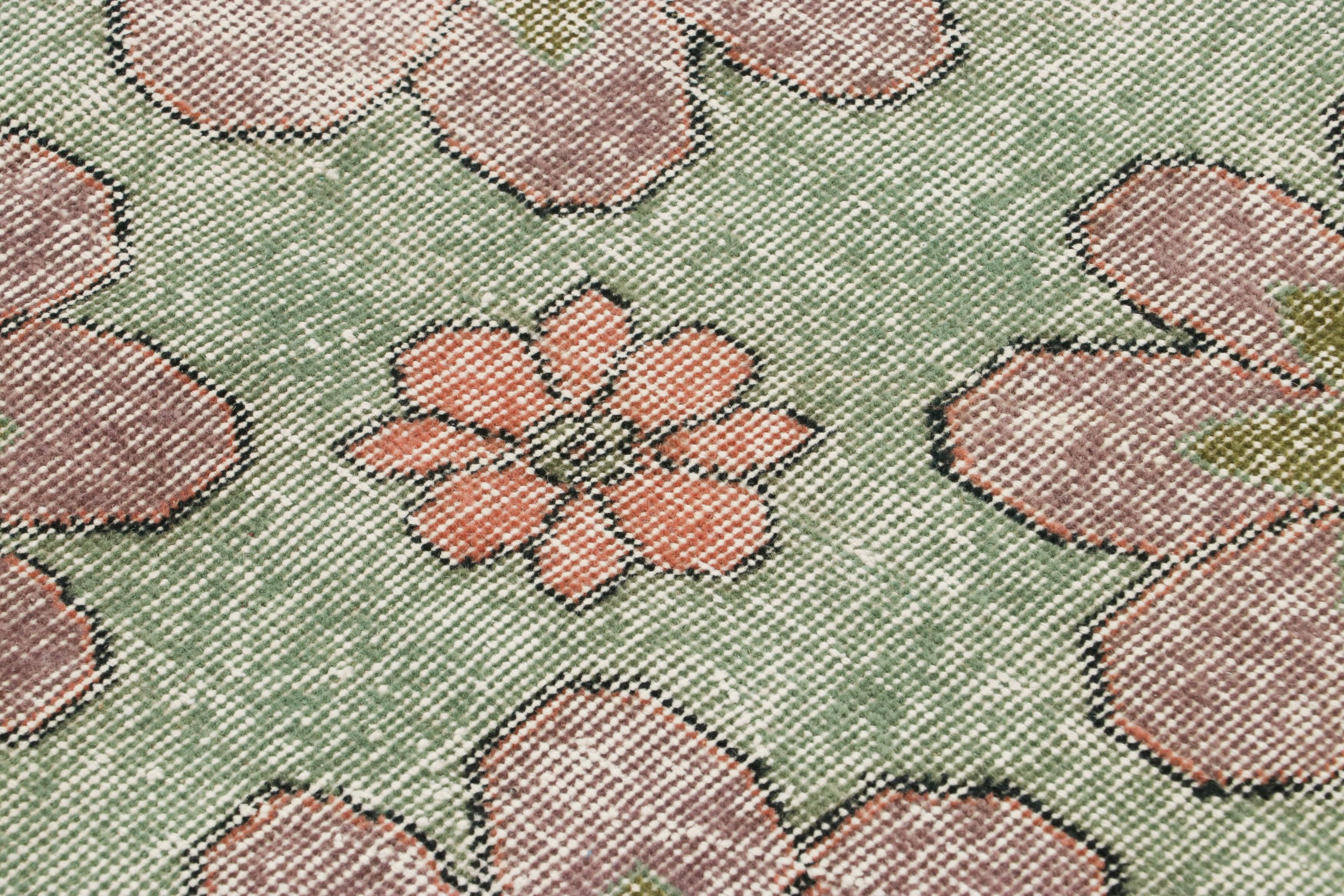 Made with hand-knotted wool circa 1950-1960, this 5x8 vintage Turkish rug of all over floral medallion design is an exciting new distressed addition to the Rug & Kilim’s collection of rare mid-century rugs.

On the Design:

A sage green and teal