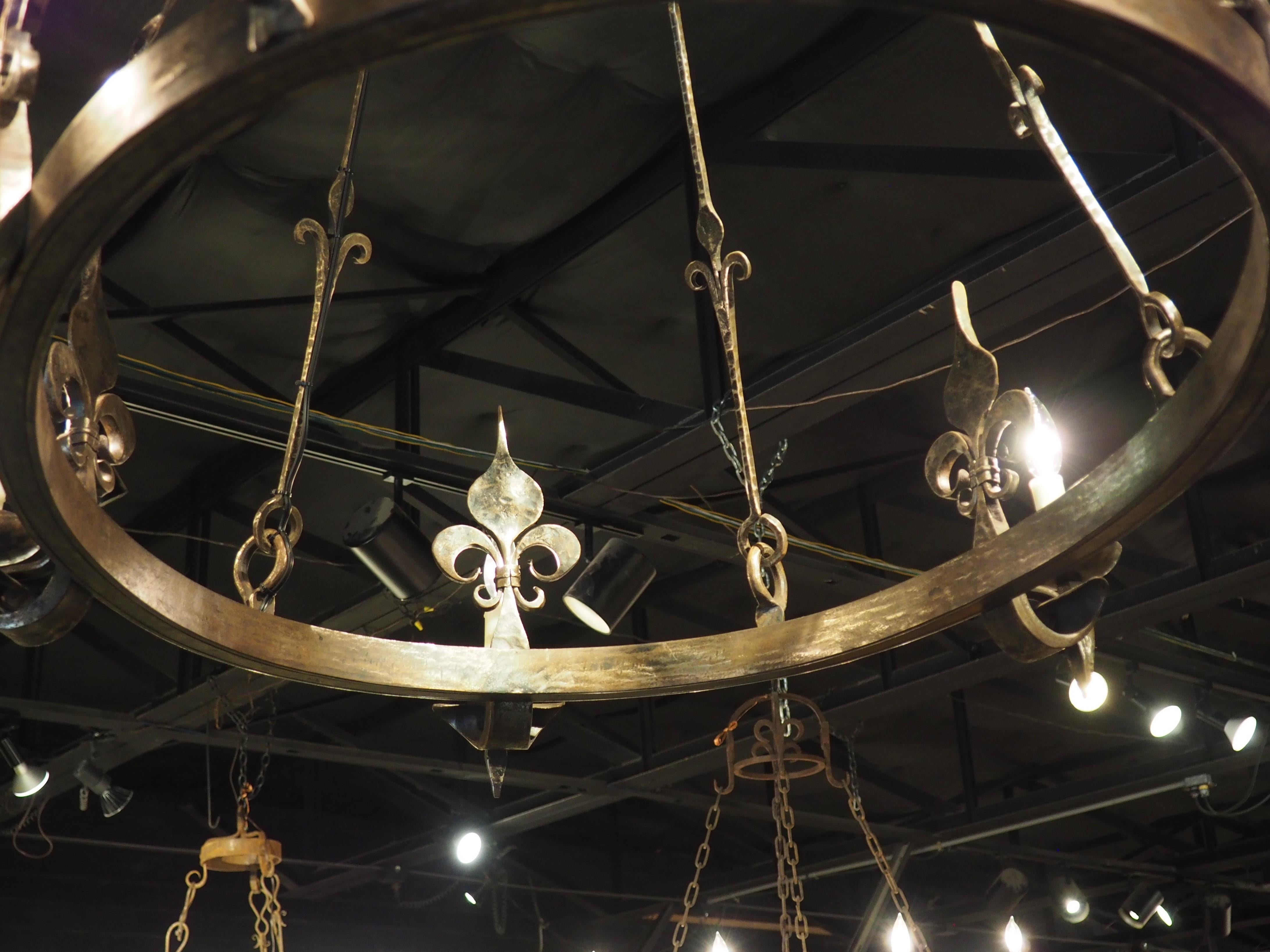 Medieval 1960s Hand Wrought Iron Oval Fleur De Lys Chandelier from Brittany, France For Sale