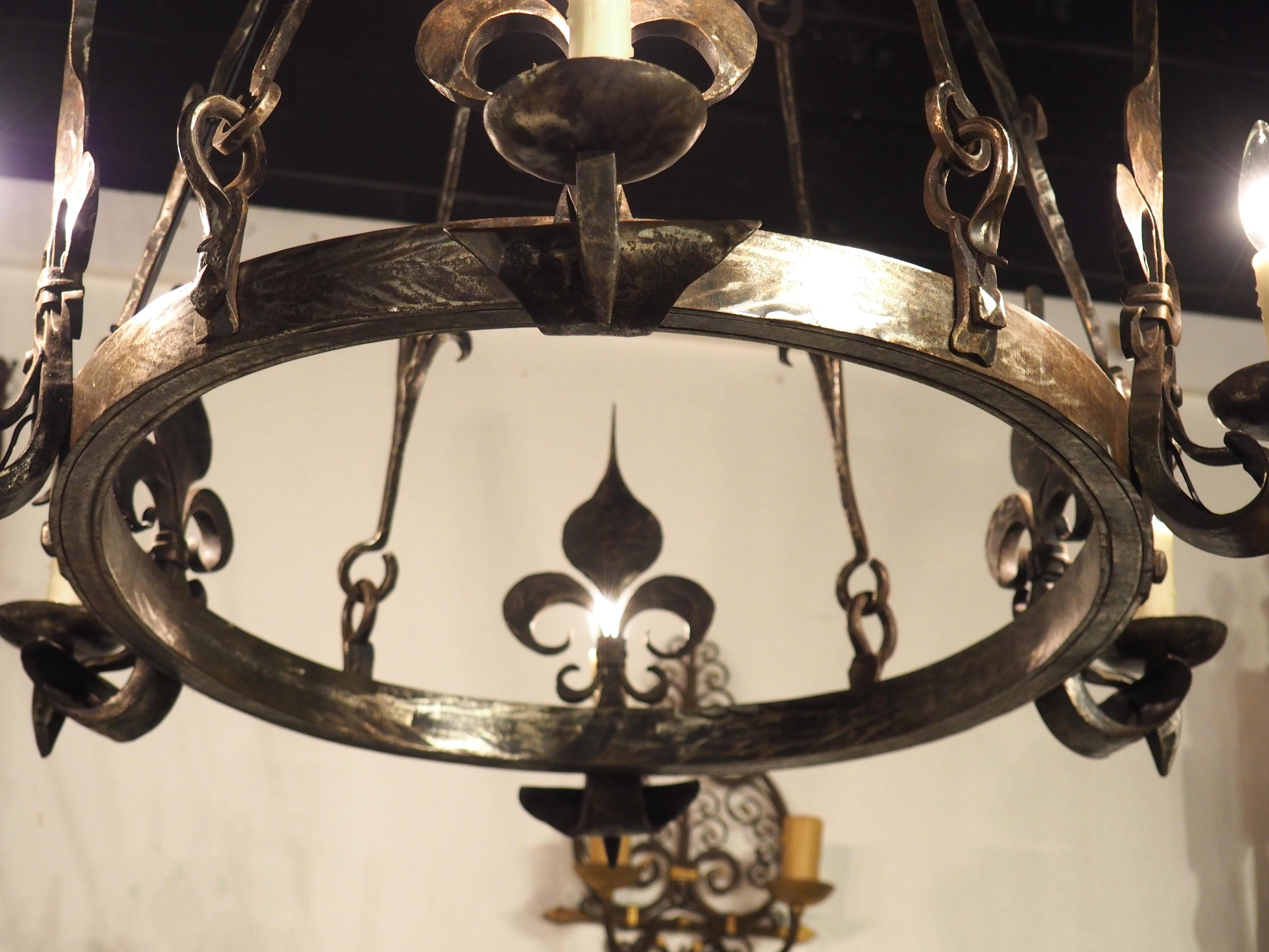 Metal 1960s Hand Wrought Iron Oval Fleur De Lys Chandelier from Brittany, France For Sale