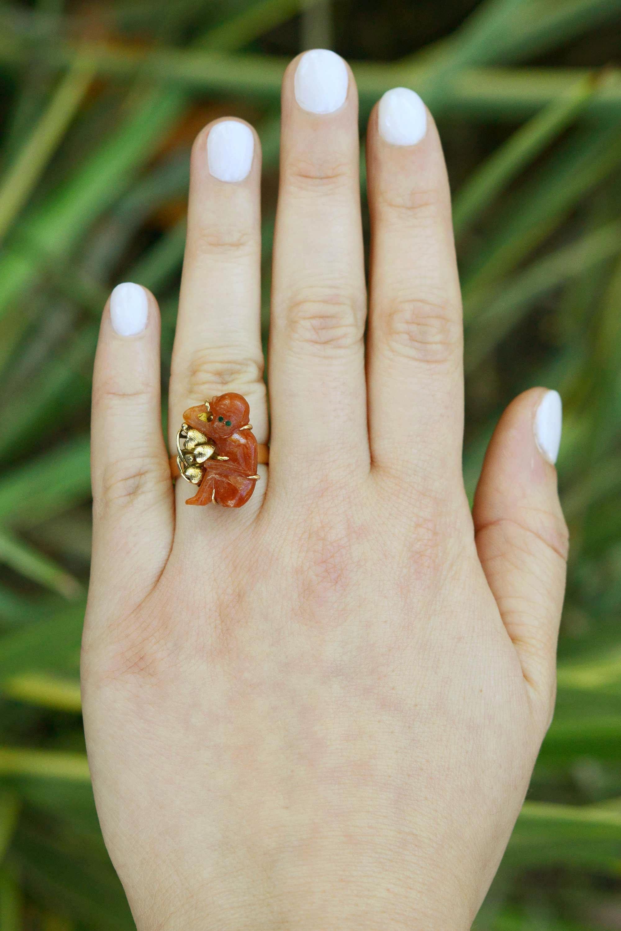 This ring is a summation of 1960s eccentric animal jewelry. The hand carved carnelian monkey is poised yet relaxed, resting in a bed of 14k yellow gold. This ring has a fabulous patina and sweet sentiment. An interesting keepsake to add to your