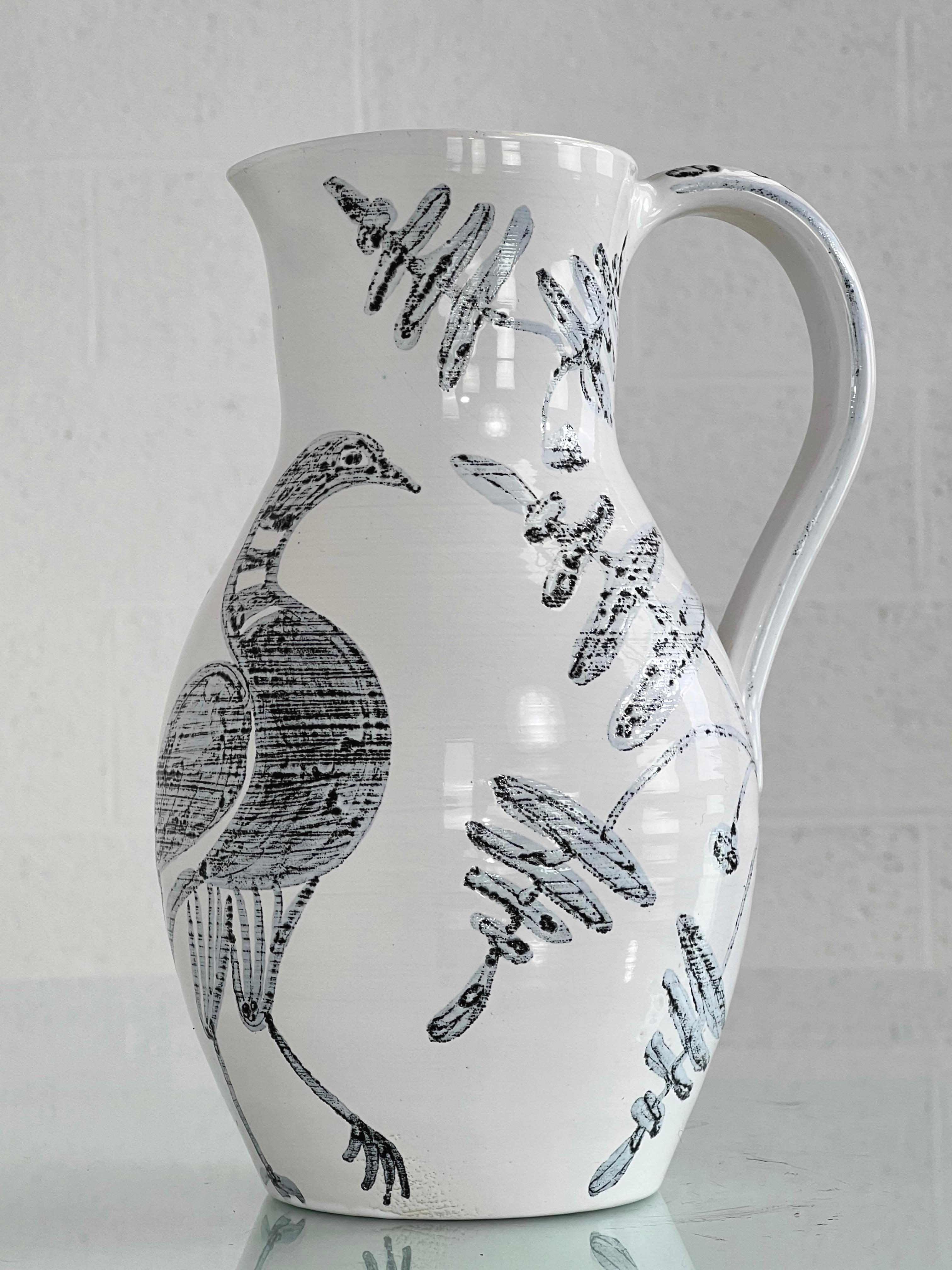 1960s Handmade Ceramic Pitcher Vase with white color glaze and adorned with peacock scene