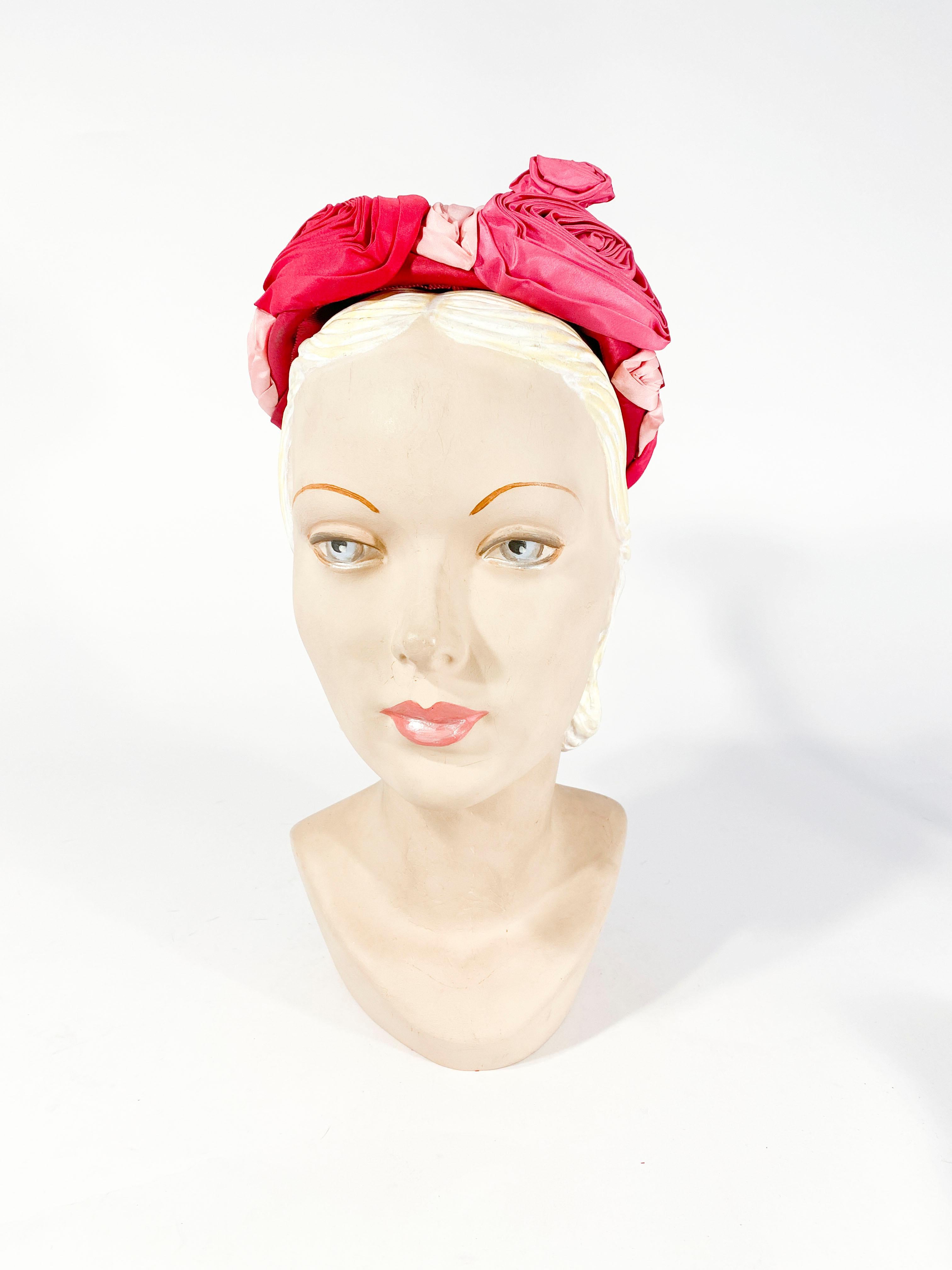 1960s hand-sculpted hat with multi-colored dusty roses and pastel pinks in pleated/gathered satin.