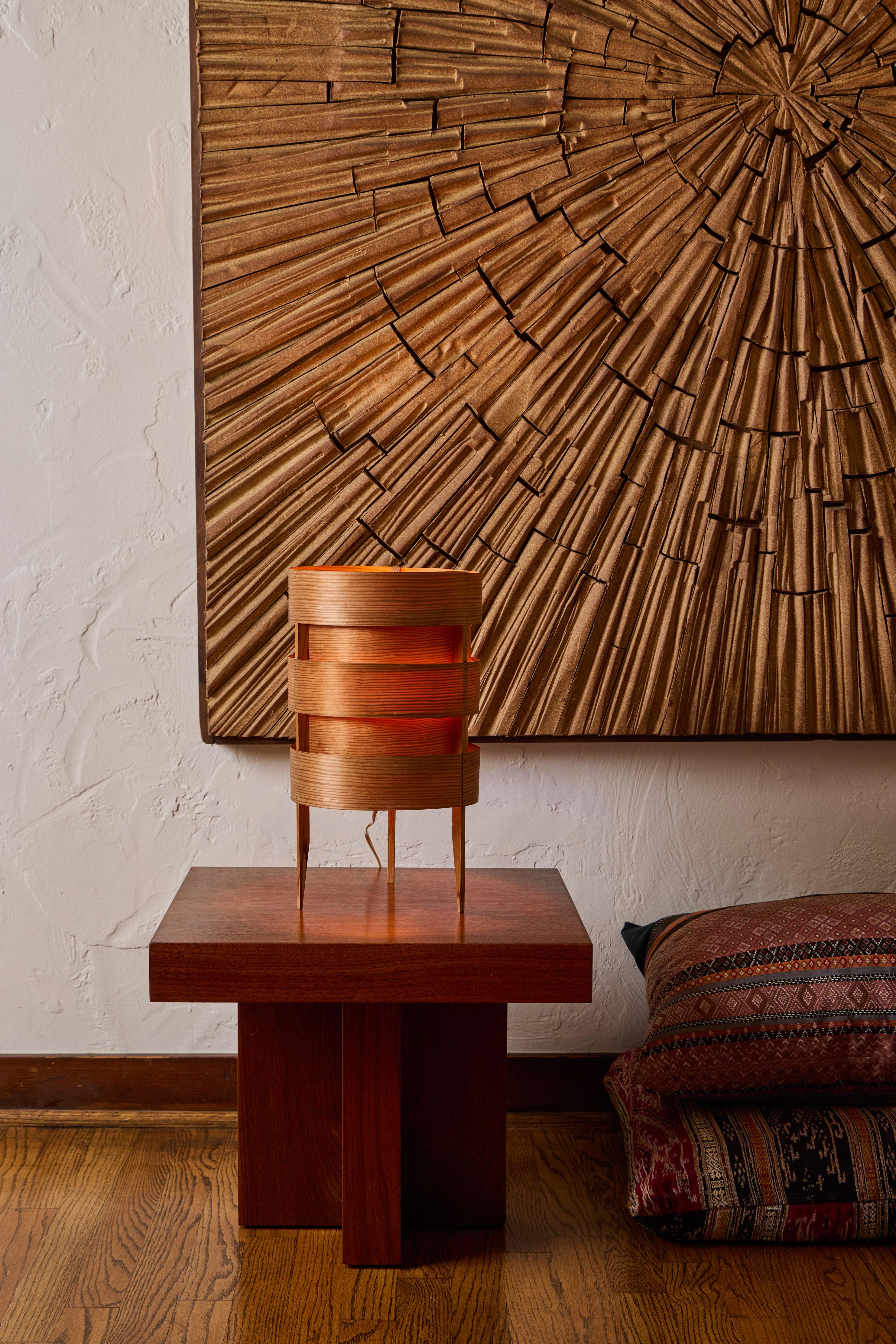 1960s Hans-Agne Jakobsson tripod wood table lamp for AB Ellysett. 

Designed and produced by Jakobsson in Markaryd, Sweden and executed in thin bentwood with solid tripod base structure. This is a small sculptural lamp that is ideal for ambient