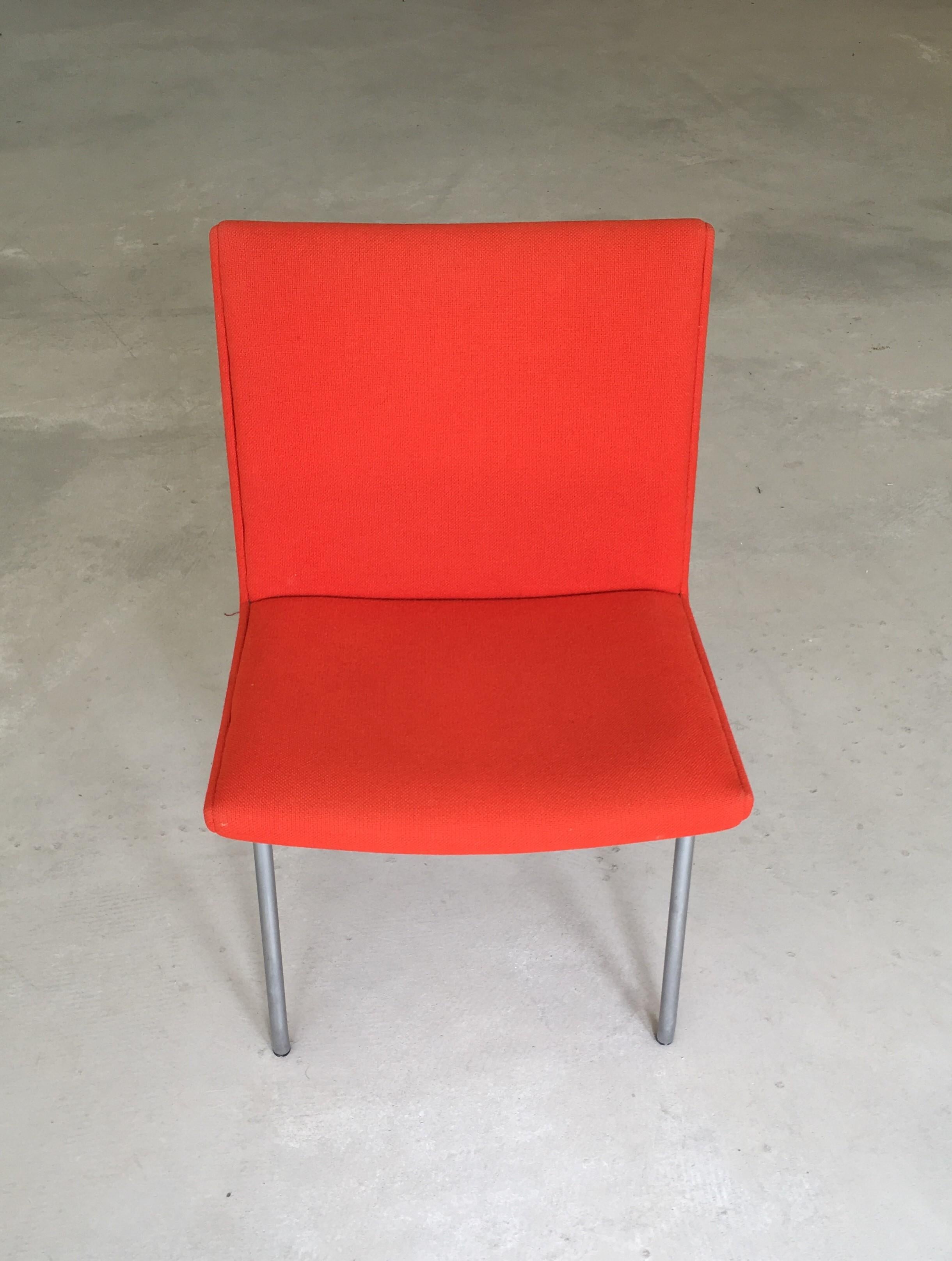 Hans Wegner AP38 'Airport' chair by A.P. Stolen.

Exceptional modern chair. Designed in 1958, on tubular-steel frames with sharp triangle boomerang shape. Seat have been reupholstered with orange Kvadrat Hallingdal 65. 

Although not designed