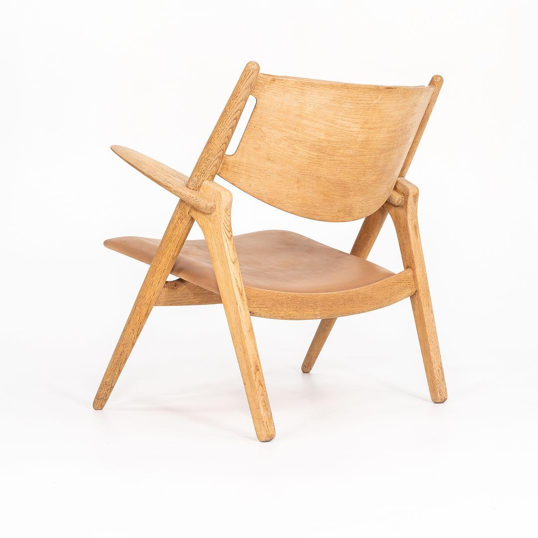 1960er Jahre Hans Wegner für Carl Hansen & Sohn CH28P Sawbuck Loungesessel aus Eichenholz (Leder) im Angebot