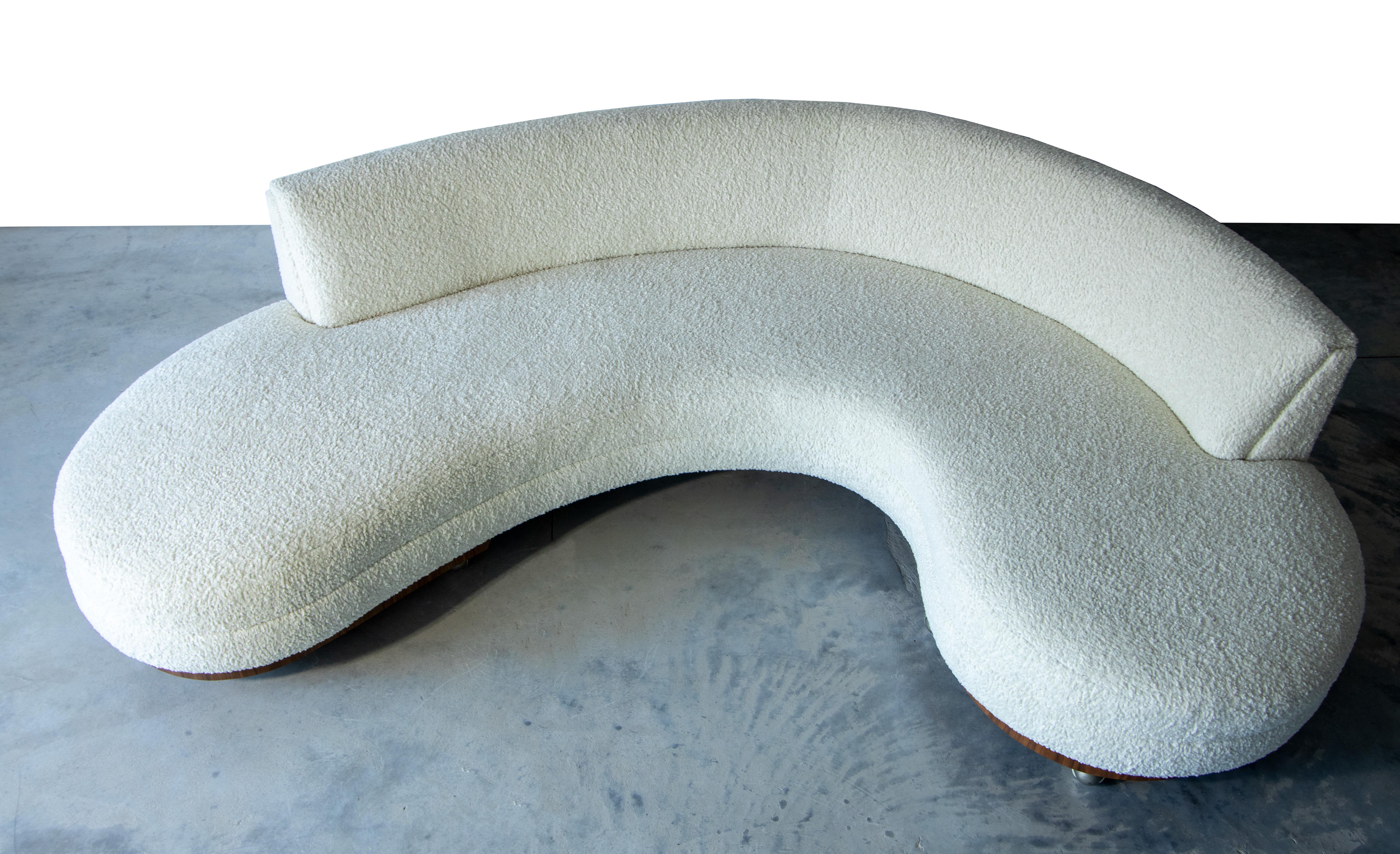 A curvy serpentine shaped sofa by the furniture company Harris of California. This design was until very recently attributed to an early serpentine sofa designed by Vladimir Kagan. We were able to obtain an original advertisement that proves this