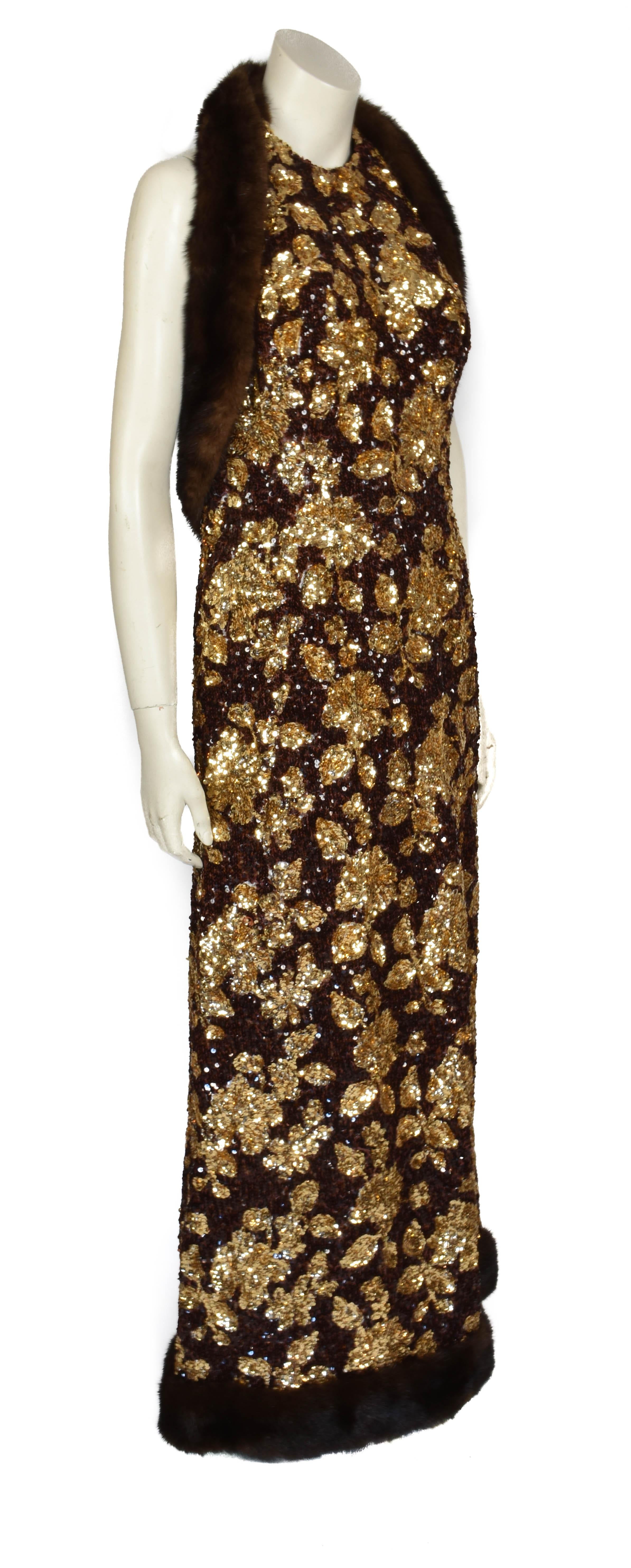 This exceptional evening gown by Jacques Heim is entirely covered in brown and gold sparkling sequins and has a fluffy fur trim. It is a true Haute Couture masterpiece dating back to the early 1960's. This vintage evening gown is extremely well
