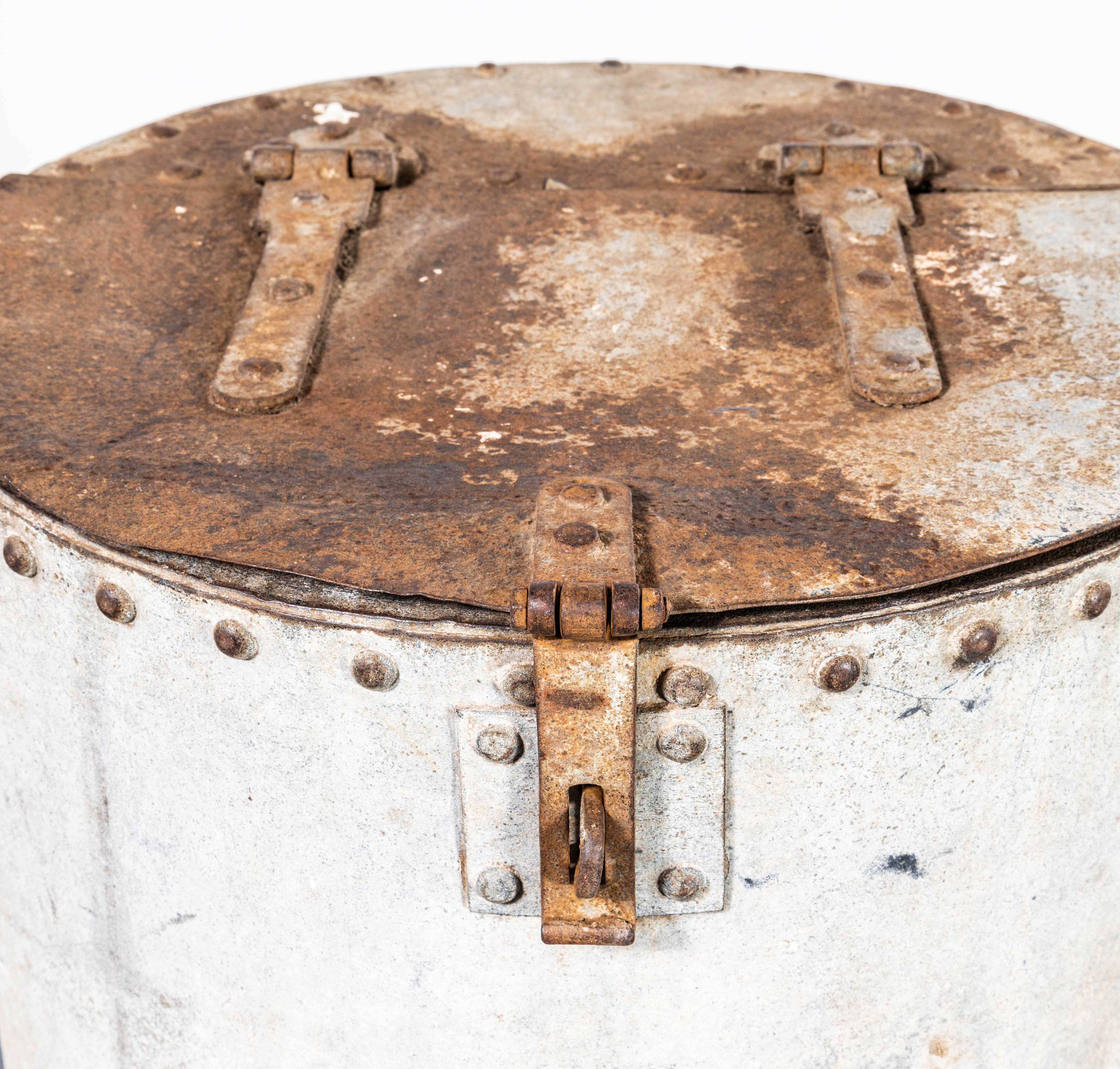 1960's Heavy Weight Rivetted Round Grain Bin. 

These grain bins are a staple functional item from farms throughout Belgium, used to hold grain feed for live stock. These bins are great as decorative storage items especially for logs in a rustic