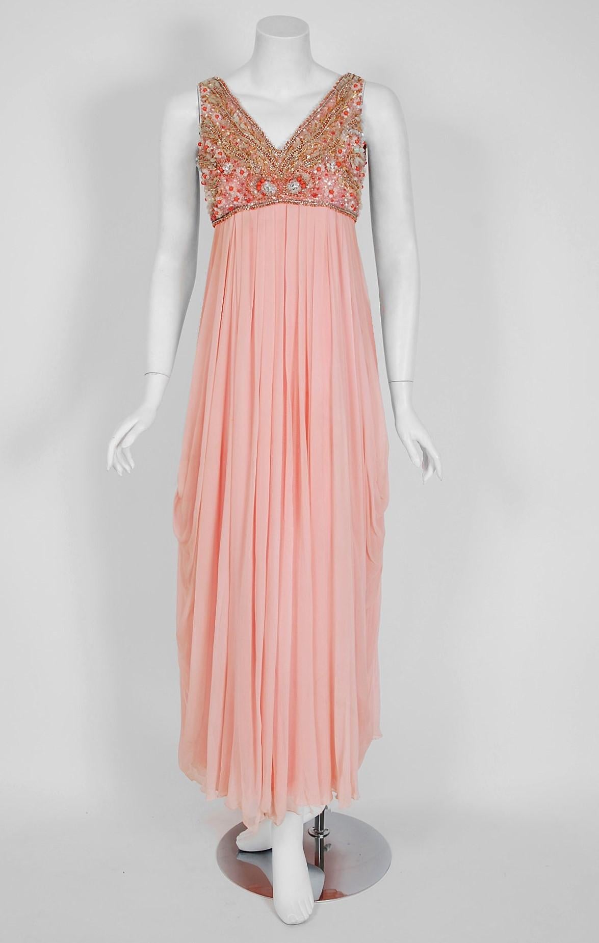 Helen Rose, like Edith Head and Irene Lentz, was one of the rare women who became chief costume designer for a major film studio. Her style was elegant and understated but still extremely innovative. This breathtaking light-pink silk chiffon goddess