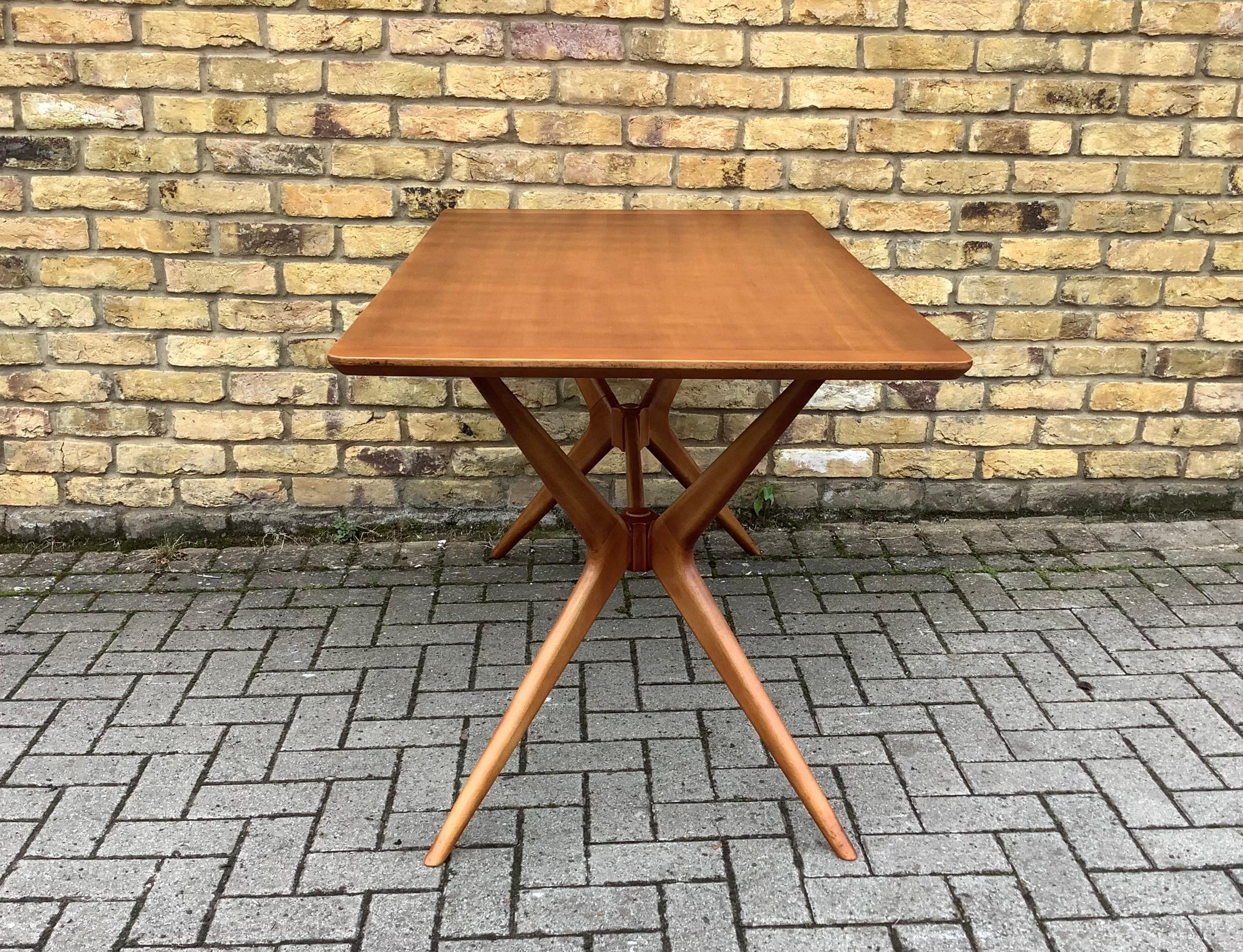 Supverb 1950’s dining table with an Italian design influence 


The construction is solid oak, which has been polished to a gorgeous light colour tone. The table is sometimes know as the

The construction is solid oak, which has been polished to a