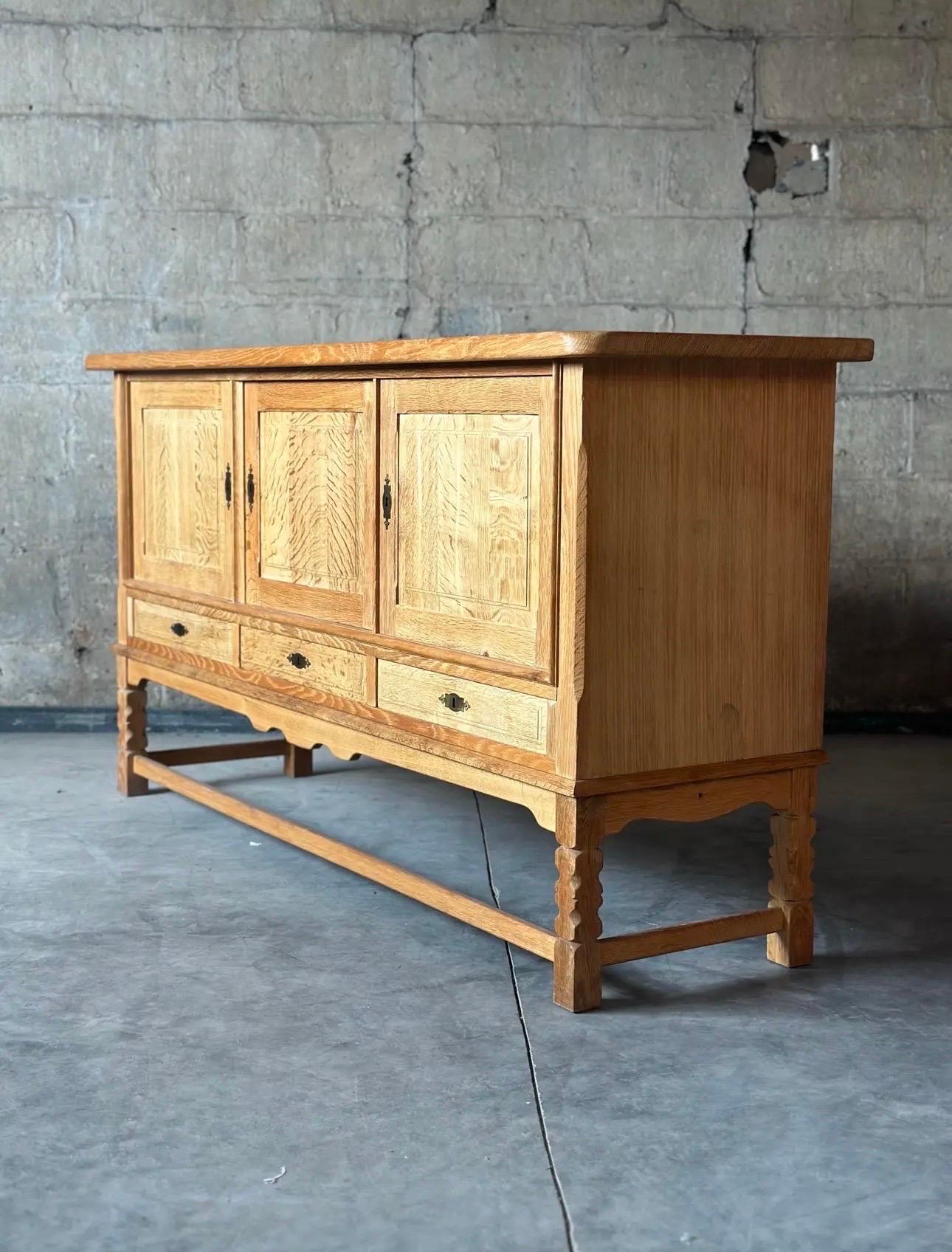 1960’s Danish sideboard in quarter-sawn oak, attributed to Henning Kjaernulf. Lots of storage and subtle sophistication in this brutalist piece!