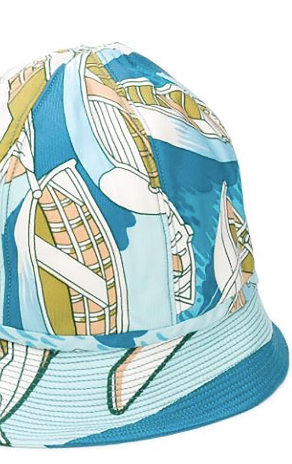 1960s  Hermes blue silk bucket hat cap featuring a boat motive. Circa 1960s.
100% silk.
Estimated size S  
Diameter 53.5cm 20,87 in
In good vintage condition. Made in France.
We guarantee you will receive this  iconic item as described and showed on