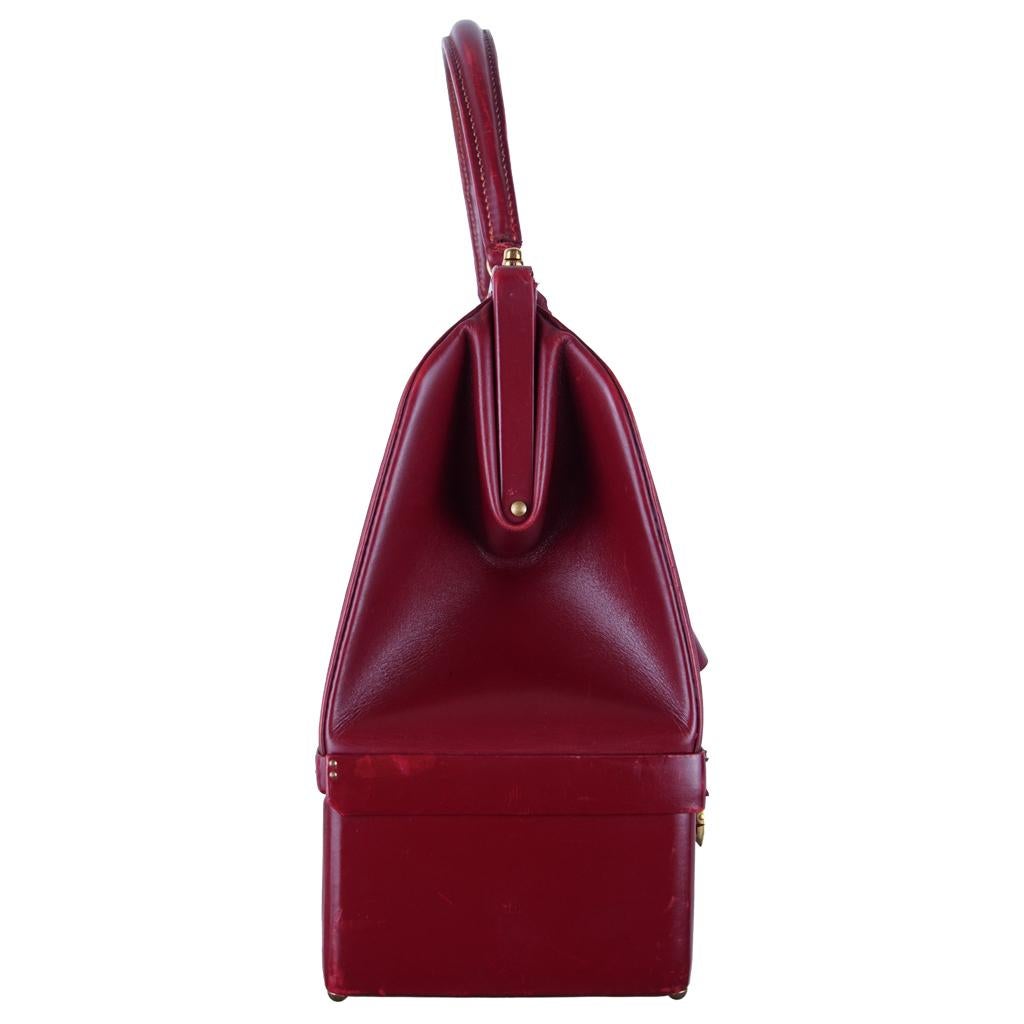 Red 1960s Hermès Bourgundy Sac Mallette Handbag with Jewel Compartment