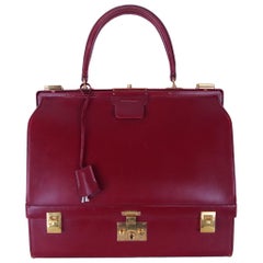 1960s Hermès Bourgundy Sac Mallette Handbag with Jewel Compartment