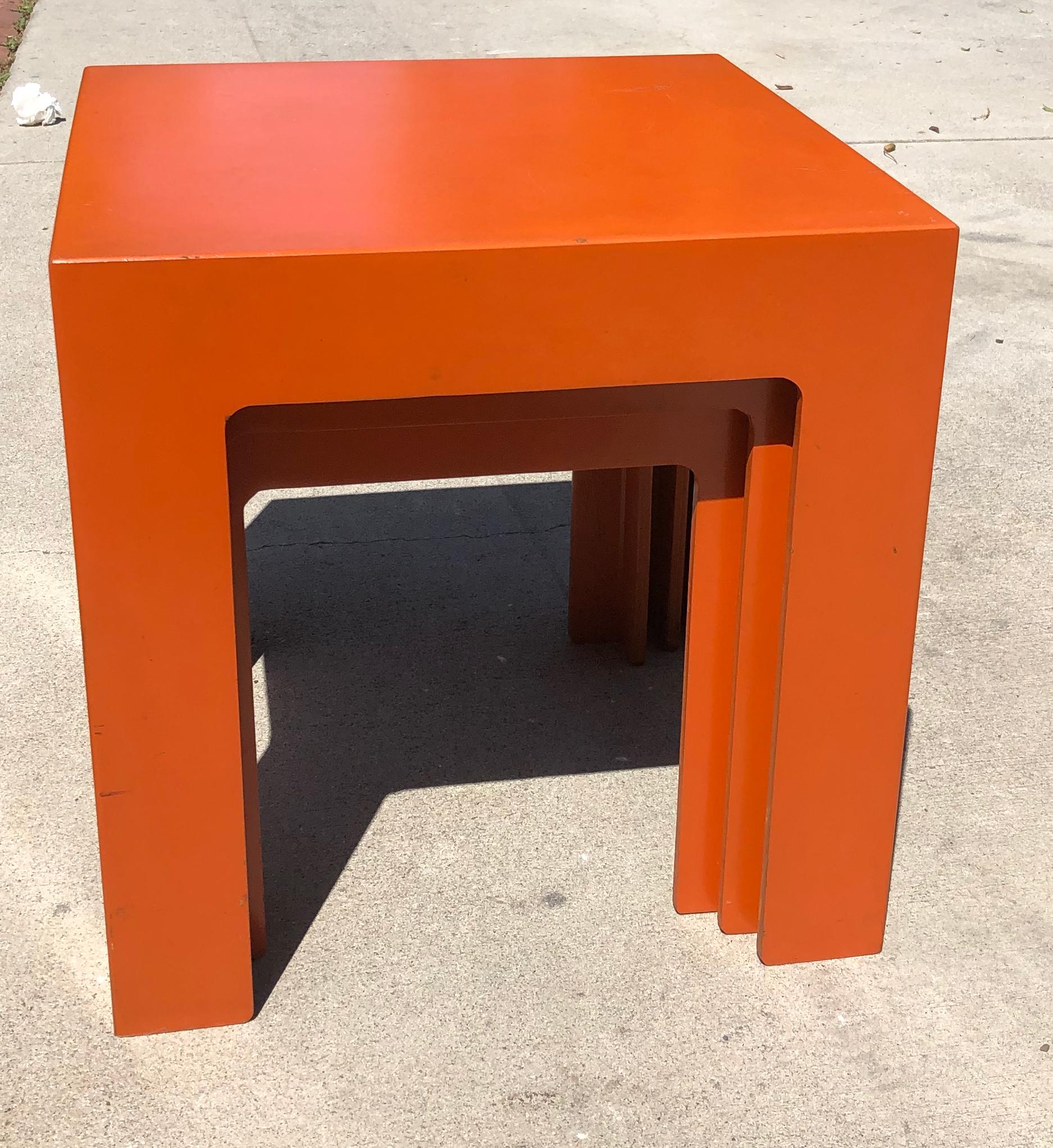 Incredible 1960's Hermes Orange Laminate Parsons stackable cube Tables
Chic, unique, vibrant and beautifully proportioned. Equally  appealing stacked or side by side;  a timeless piece which is unfindable on the market. The overall is fair with