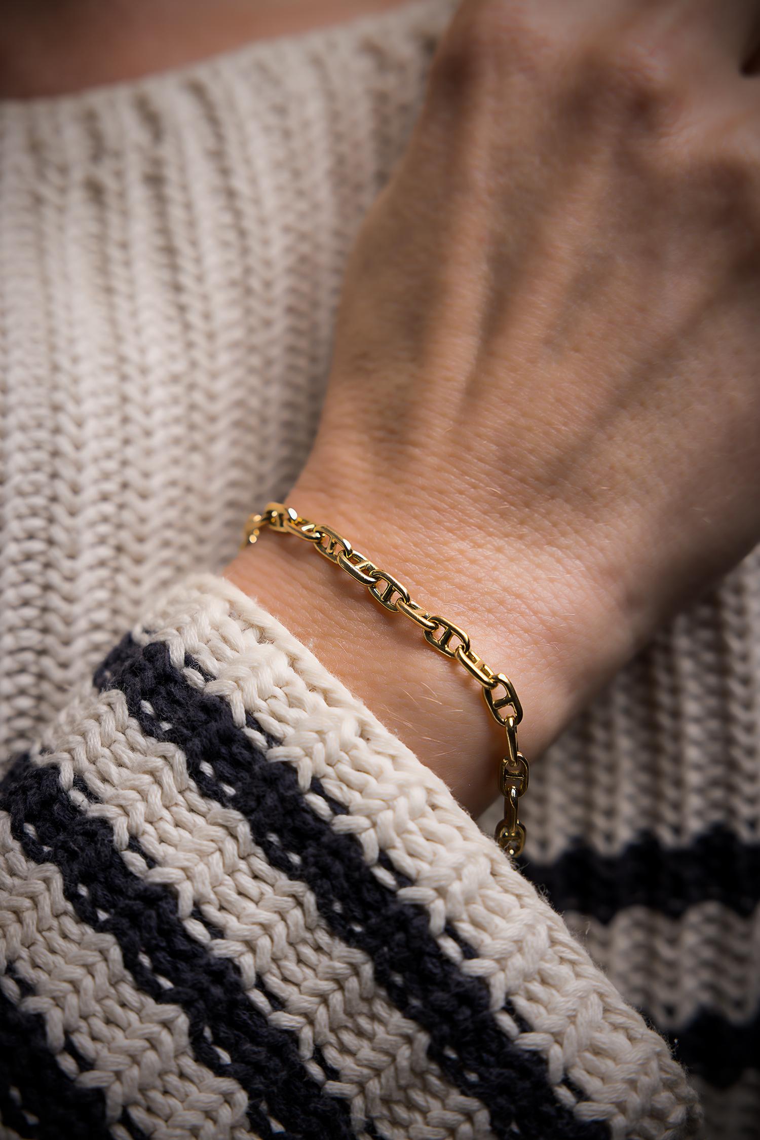Circa 1960s Hermes Paris, 18K yellow Gold Anchor Link Bracelet, signed Hermès Paris. measuring Length: 19cm. Gross weight: 11.8 g.  Solid links, tongue clasp with a safety 