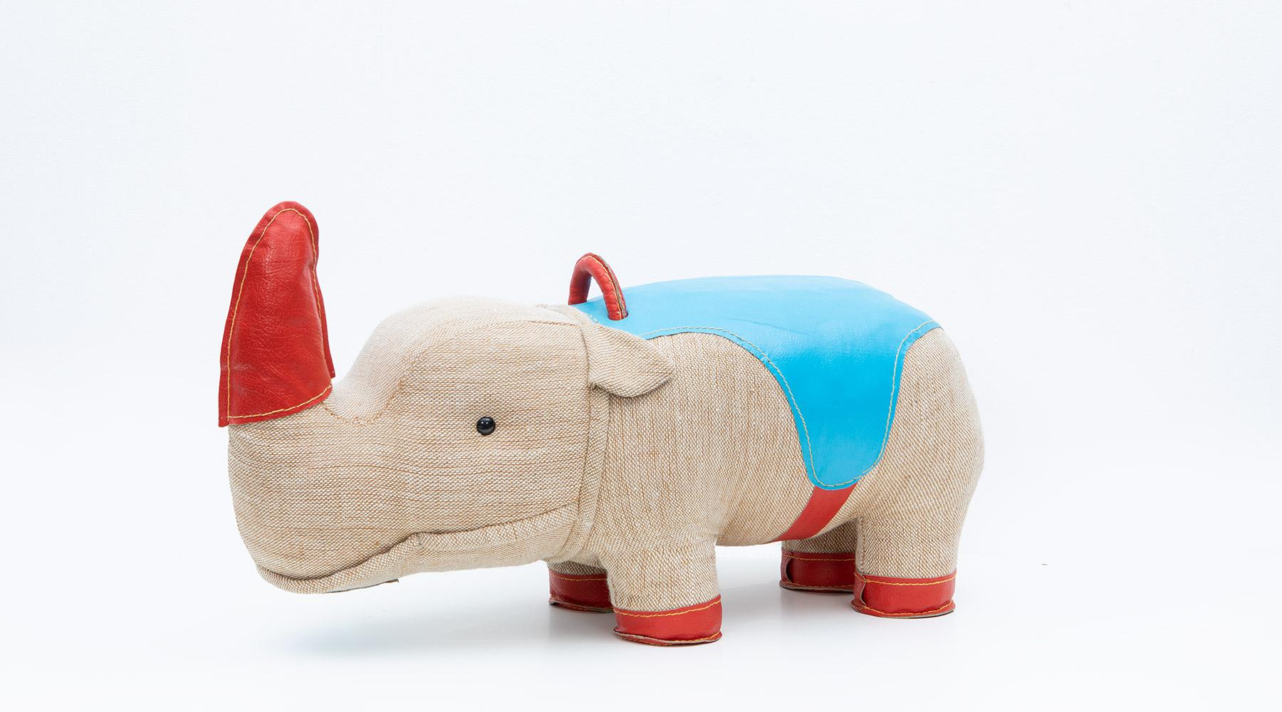 Rhino, children toy in jute and leather by Renate Müller, Germany, 1967.

Original rhino animal toy from the 1960s by Renate Müller. Unparalleled in shape and workmanship. This example shows a rhino made of jute and leather details coloured red