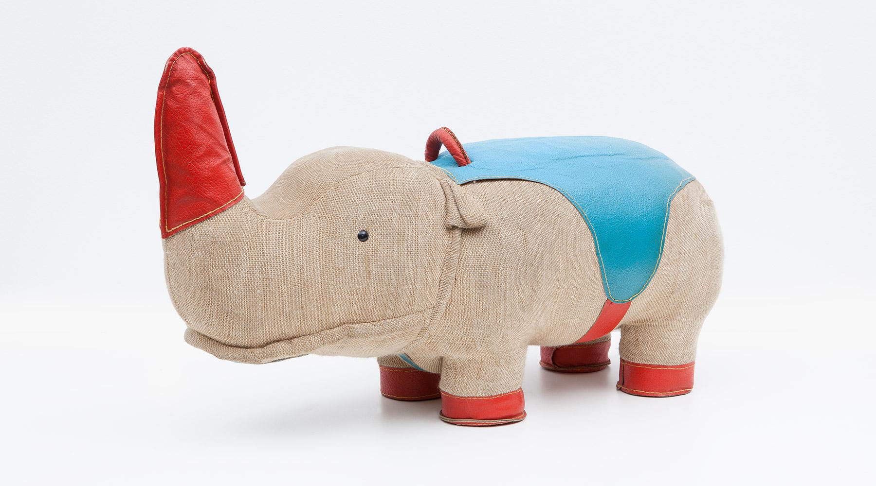 Rhino, children toy in jute and leather by Renate Müller, Germany, 1967.

Authentic animal toy from the 1960s by Renate Müller. Unique in shape and workmanship. This example shows a rhino made of jute and leather details in red and blue. High
