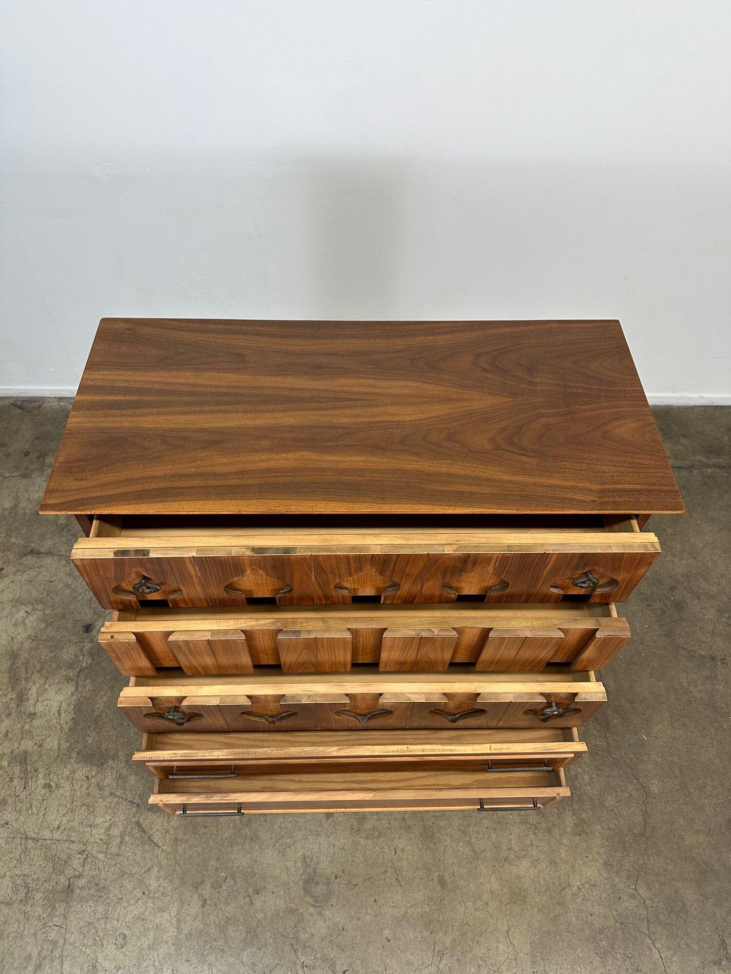 Mid-Century Modern 1960s Highboy with sculpted spade handles For Sale